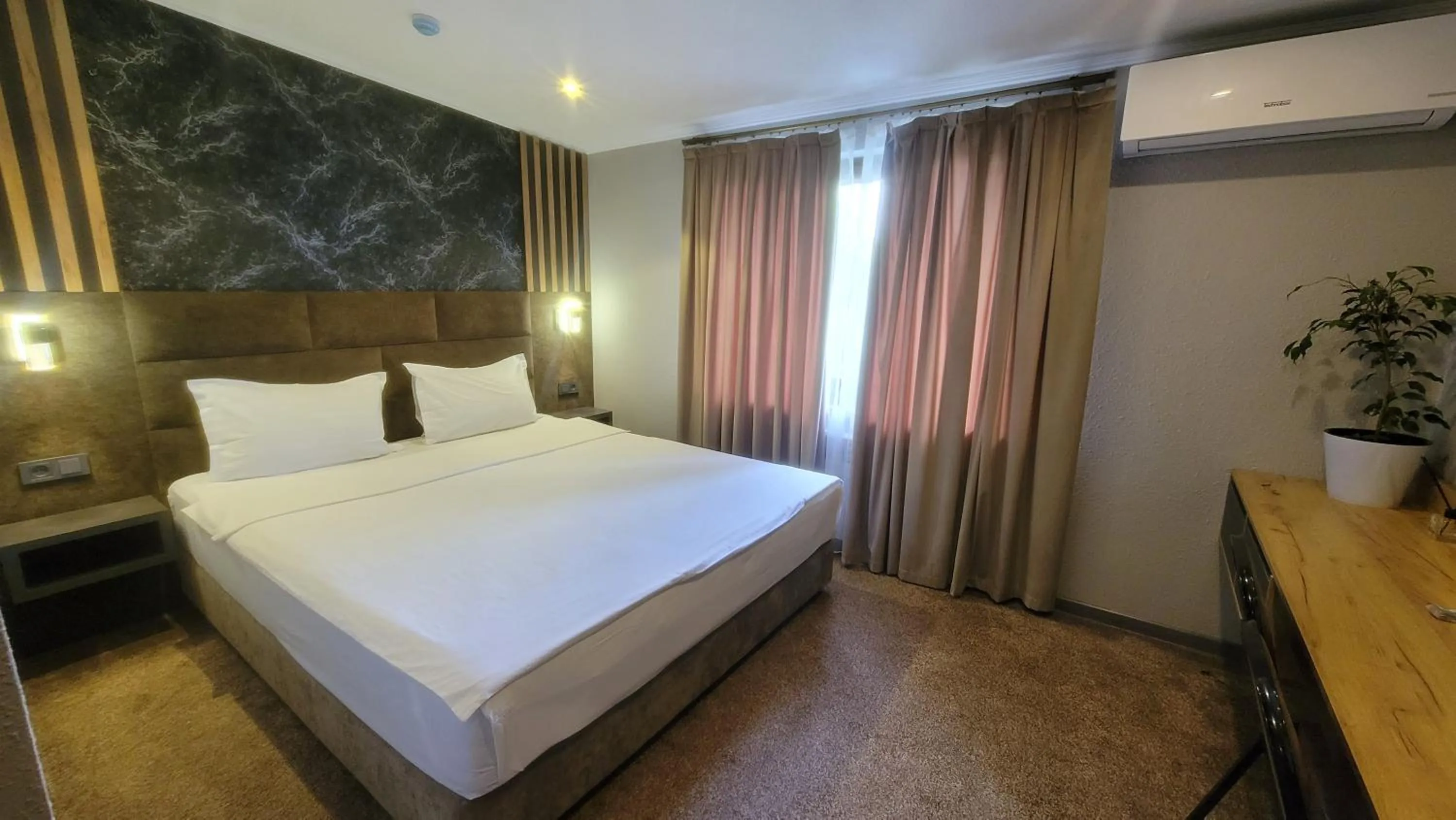 Bed in Homy House Hotel