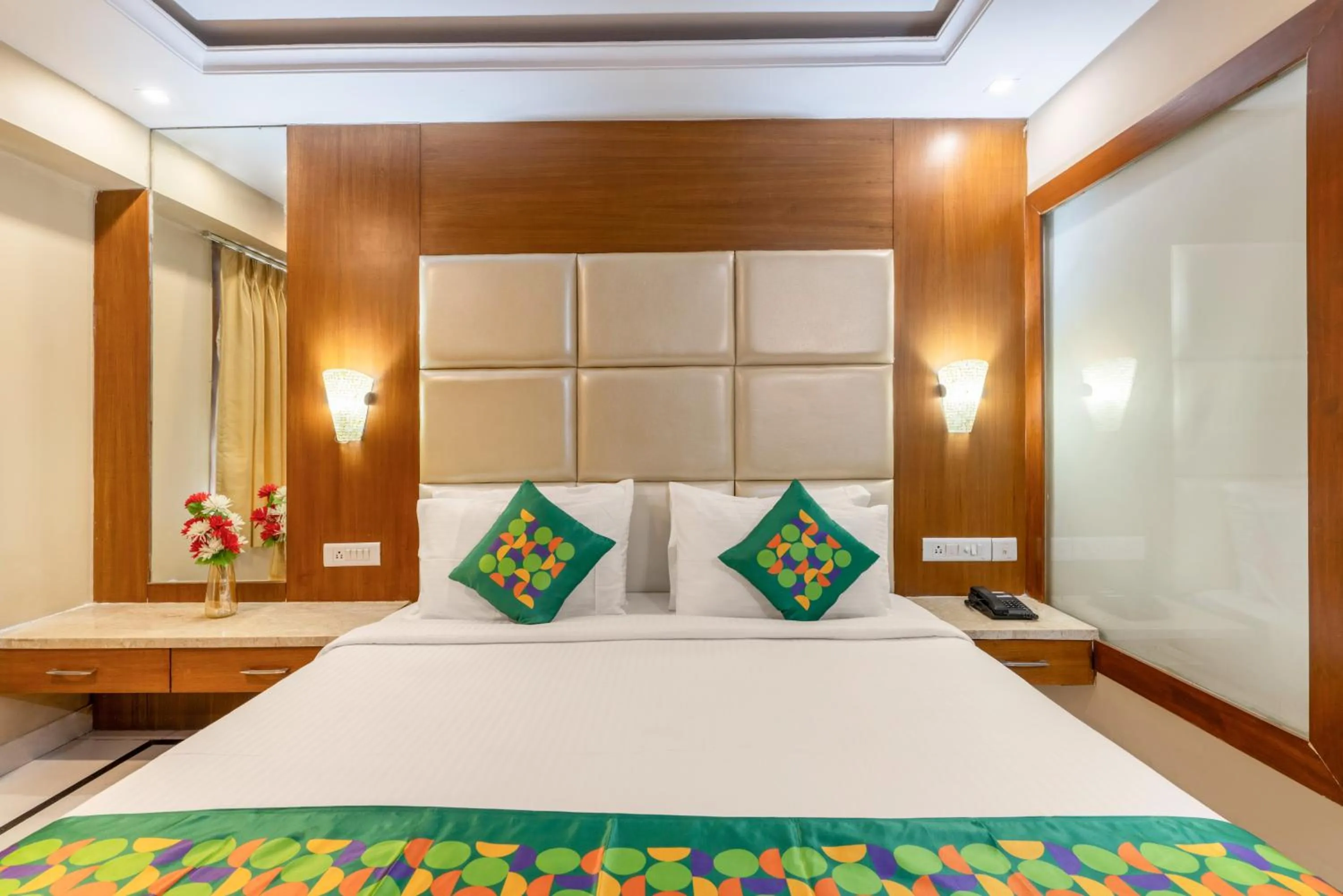 Bedroom, Bed in Treebo Premium Vinnie - Near Airport