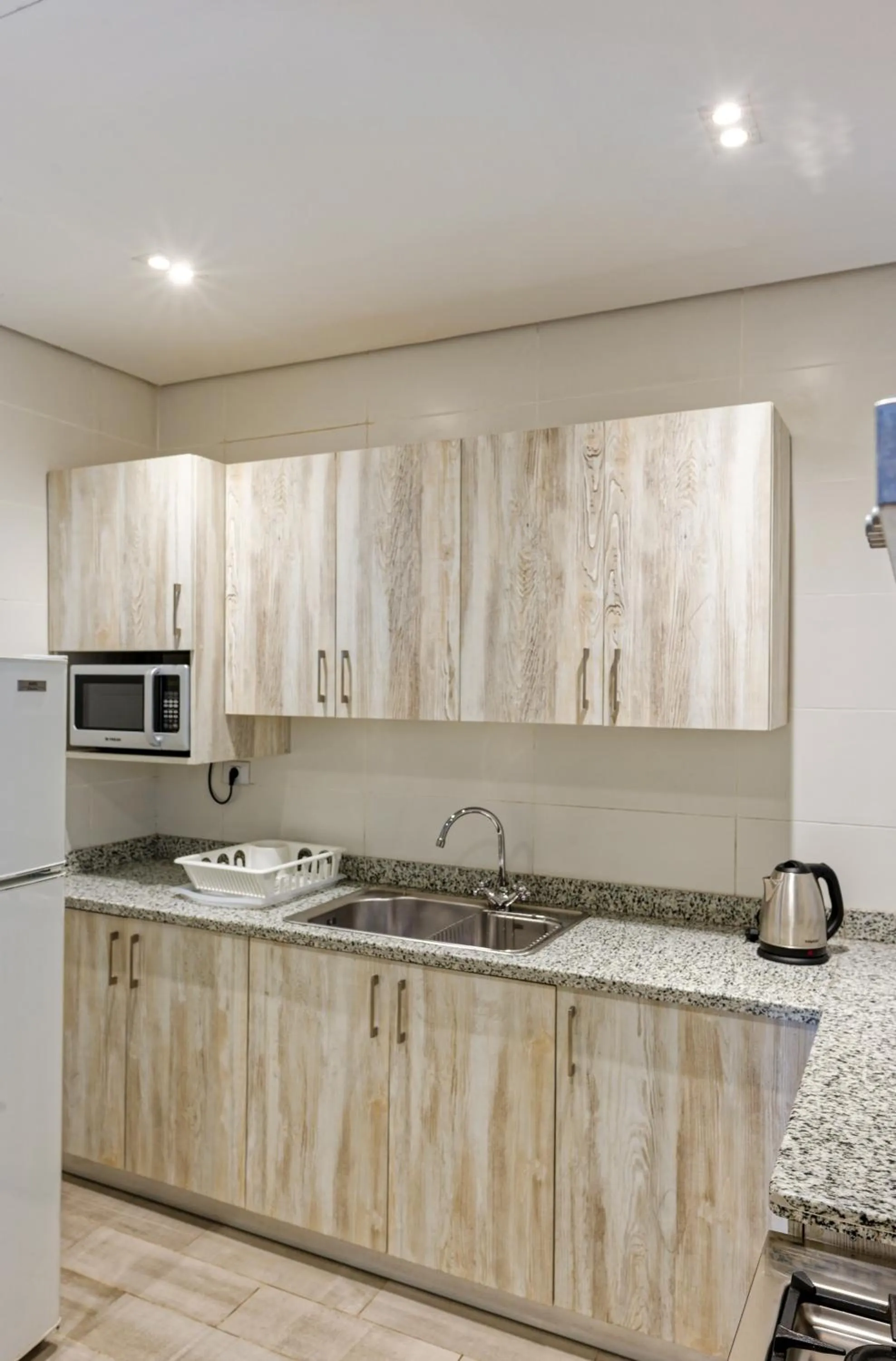 Kitchen or kitchenette in VESTA - Cairo Festival City Residence