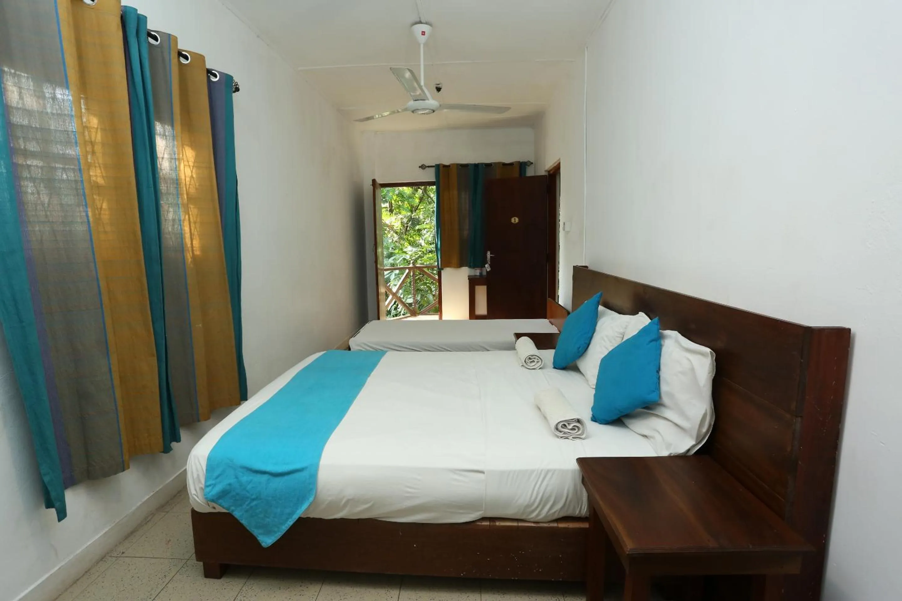 Photo of the whole room, Bed in Tree Breeze Inn