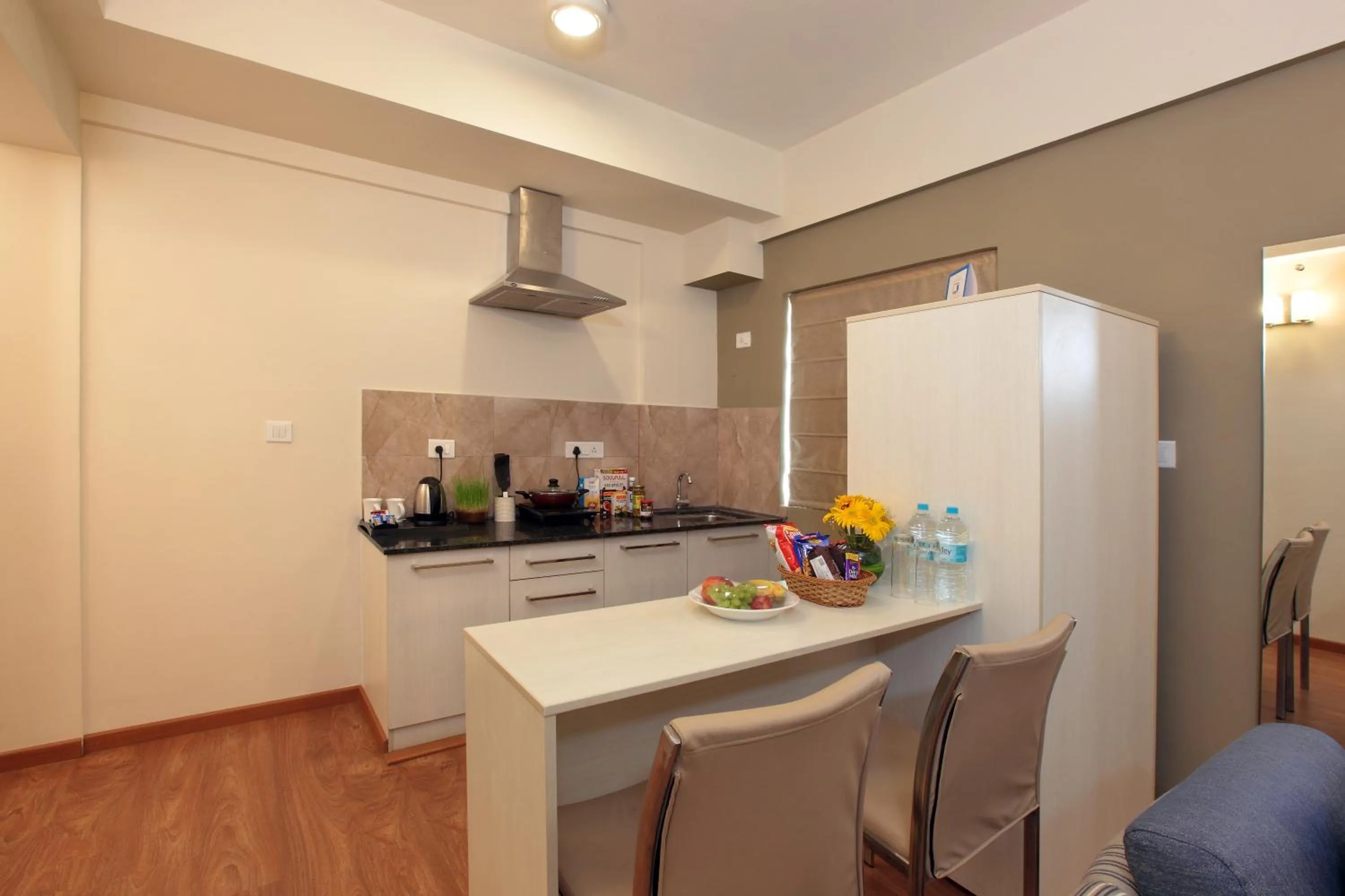 Kitchen or kitchenette in Starlit Suites Bangalore