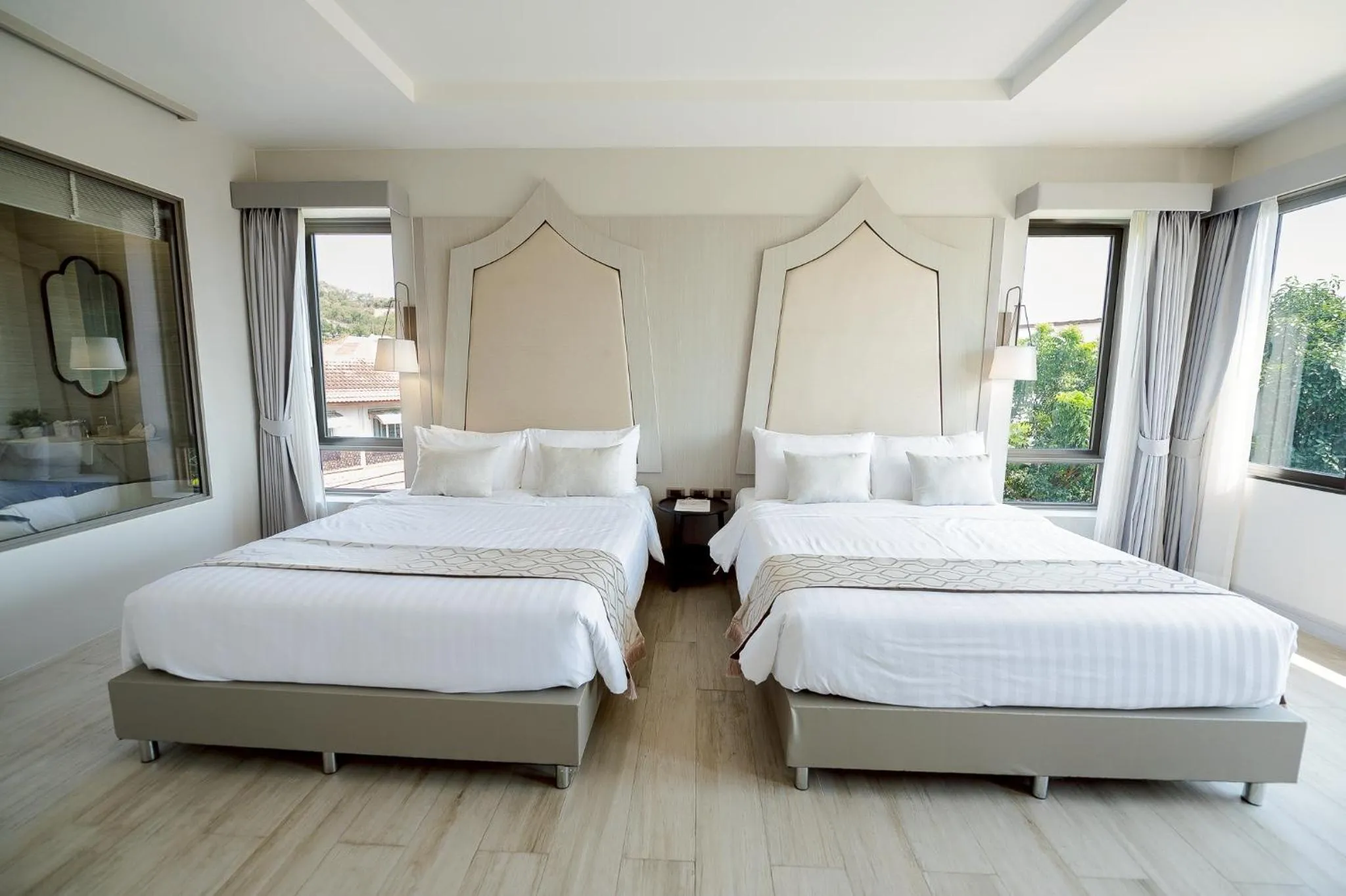 Bed in THE NAVY HOUSE HOTEL