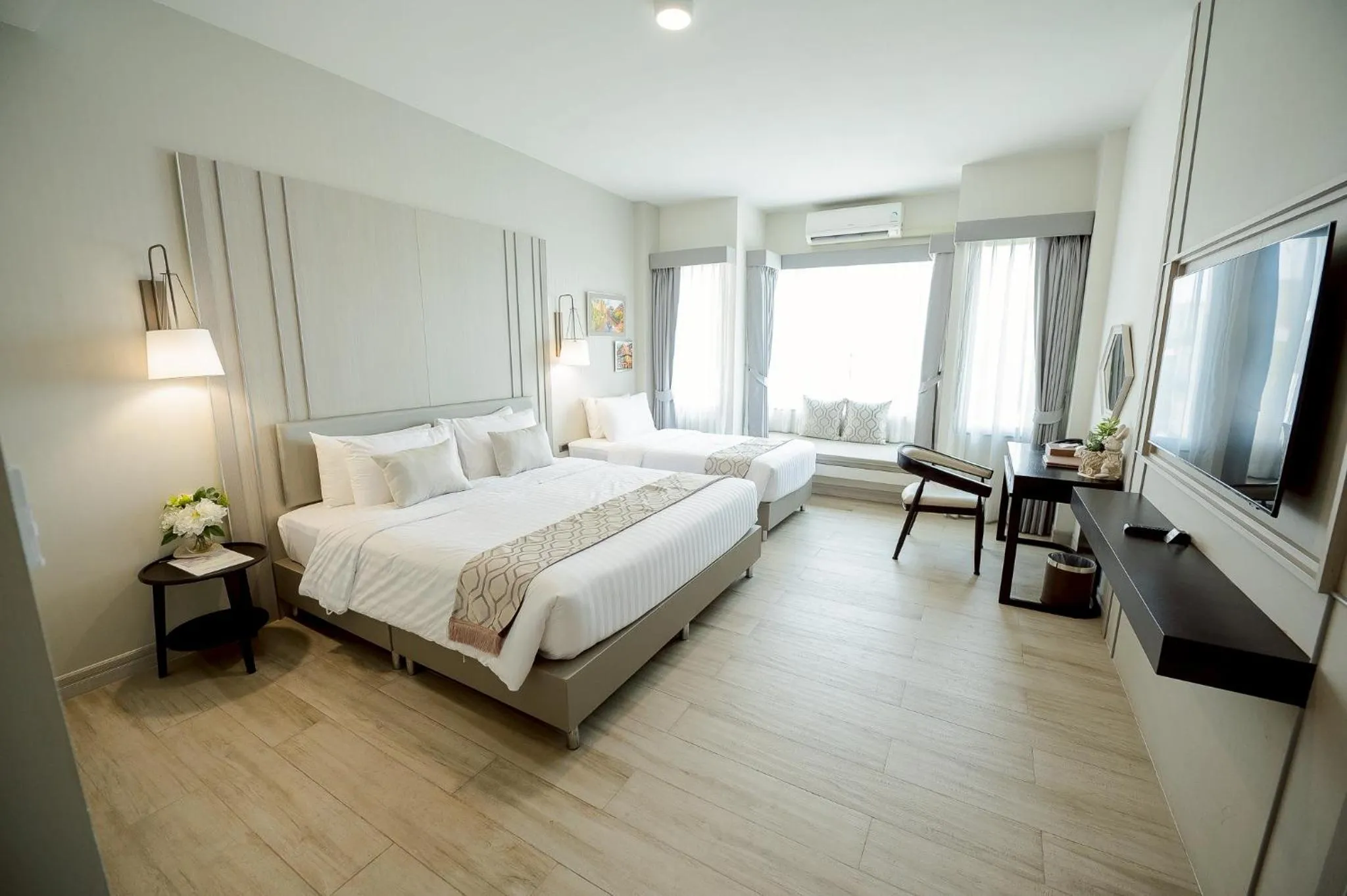 Bed in THE NAVY HOUSE HOTEL