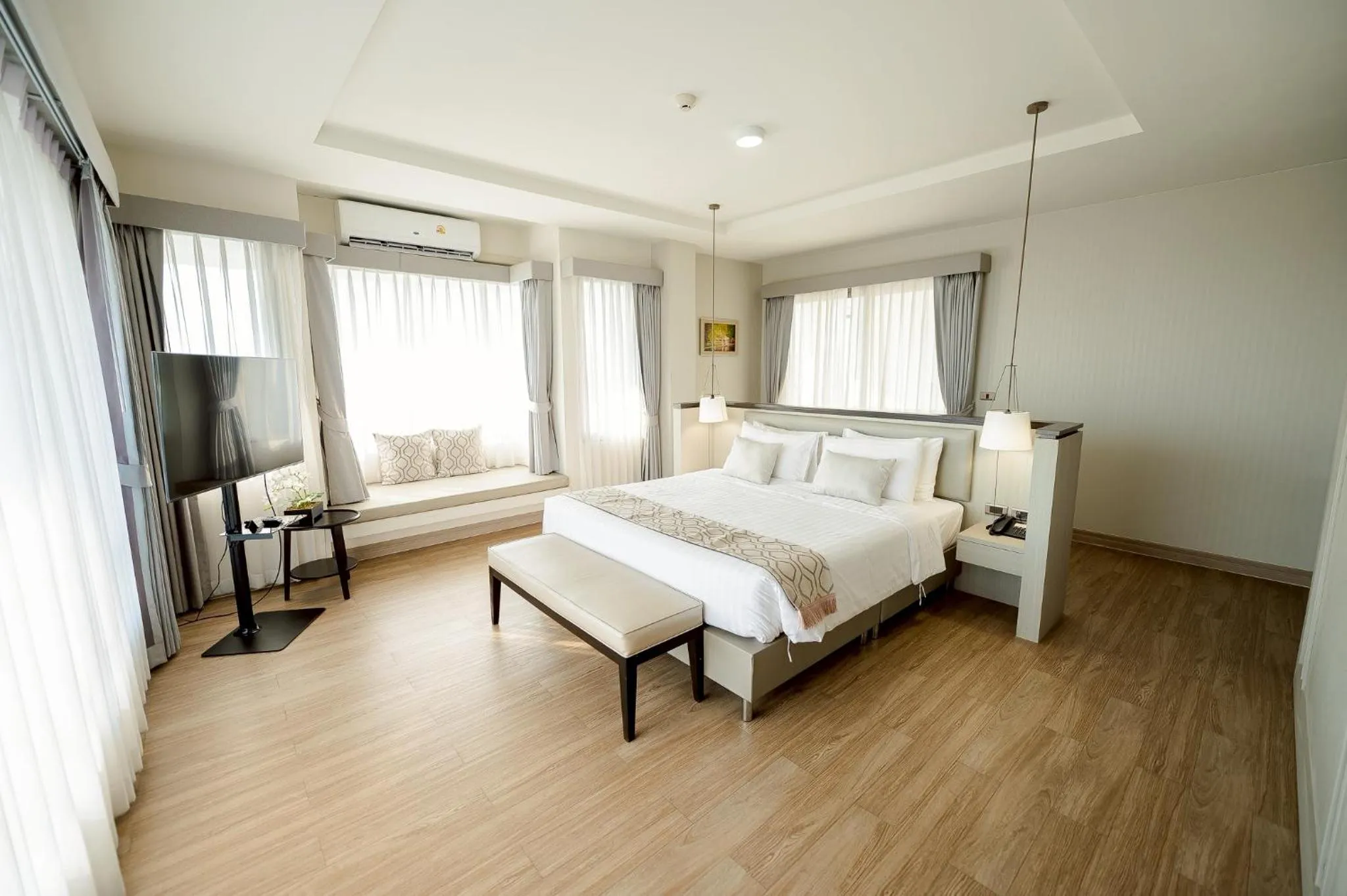 Bed in THE NAVY HOUSE HOTEL