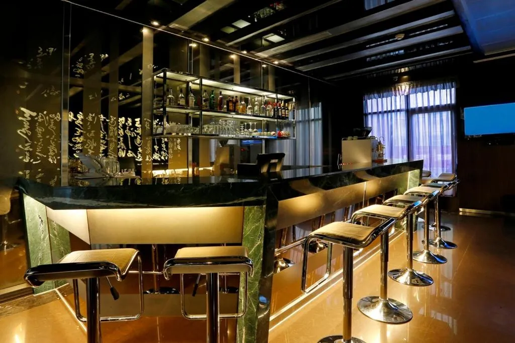 Lounge or bar in Golden Tulip - Aesthetics