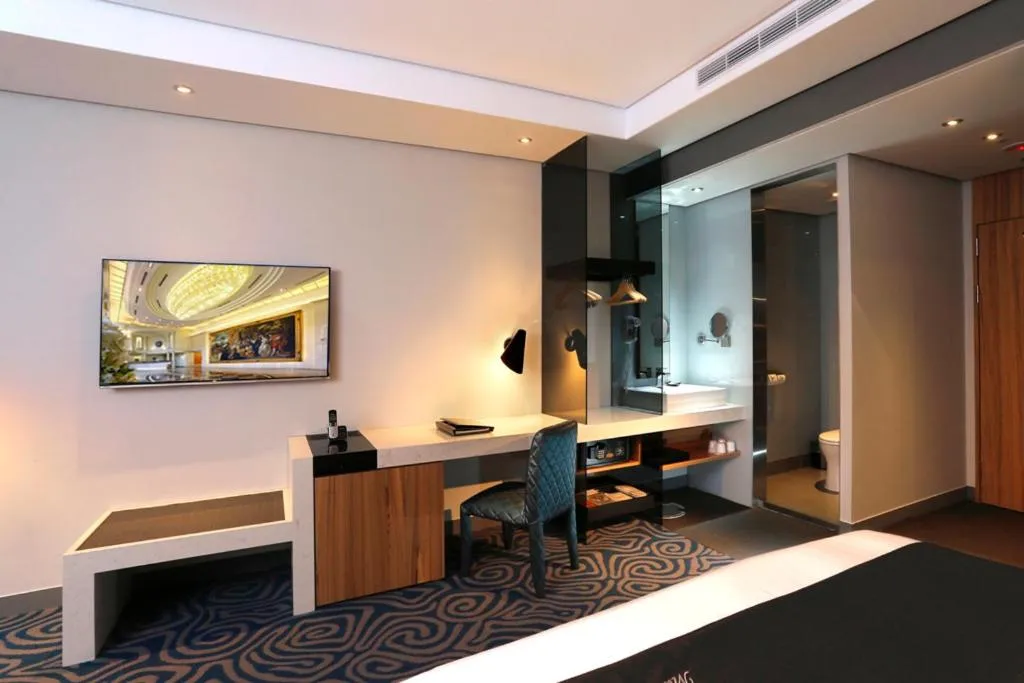 Photo of the whole room in Golden Tulip - Aesthetics