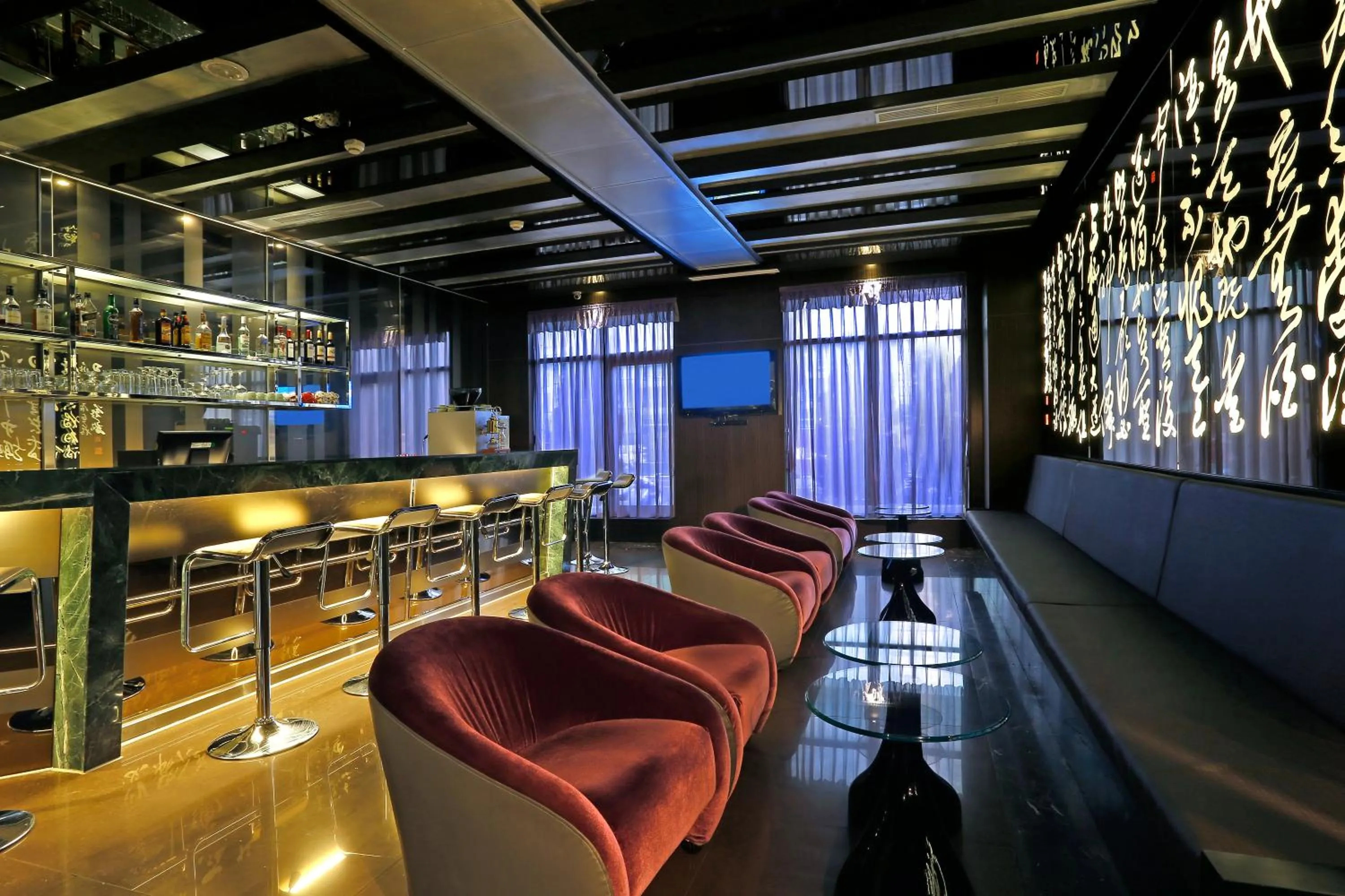 Lounge or bar in Golden Tulip - Aesthetics