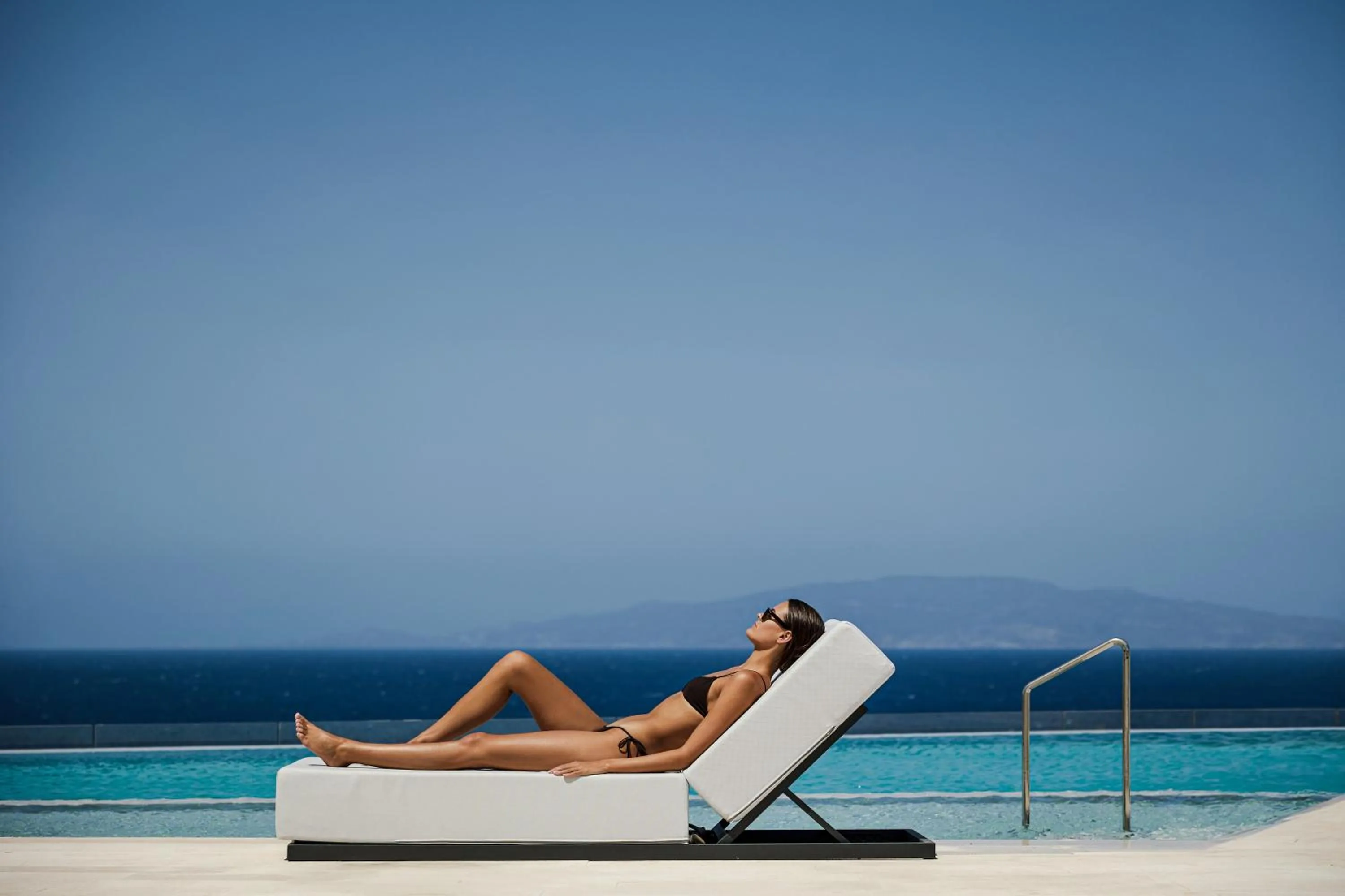 Swimming pool in Domes Novos Santorini, Autograph Collection