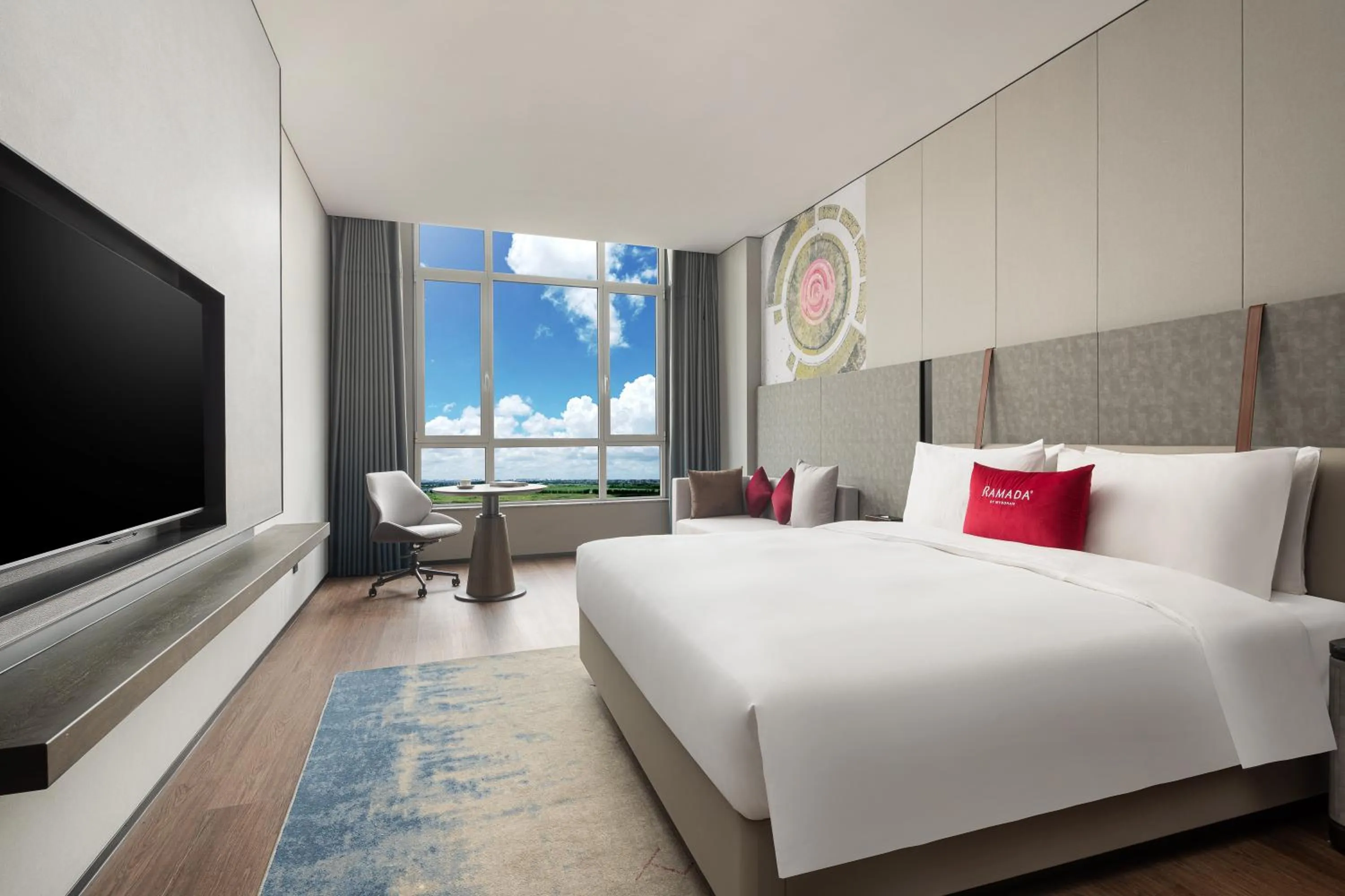 Bed in Ramada by Wyndham Qingdao Jiaodong International Airport