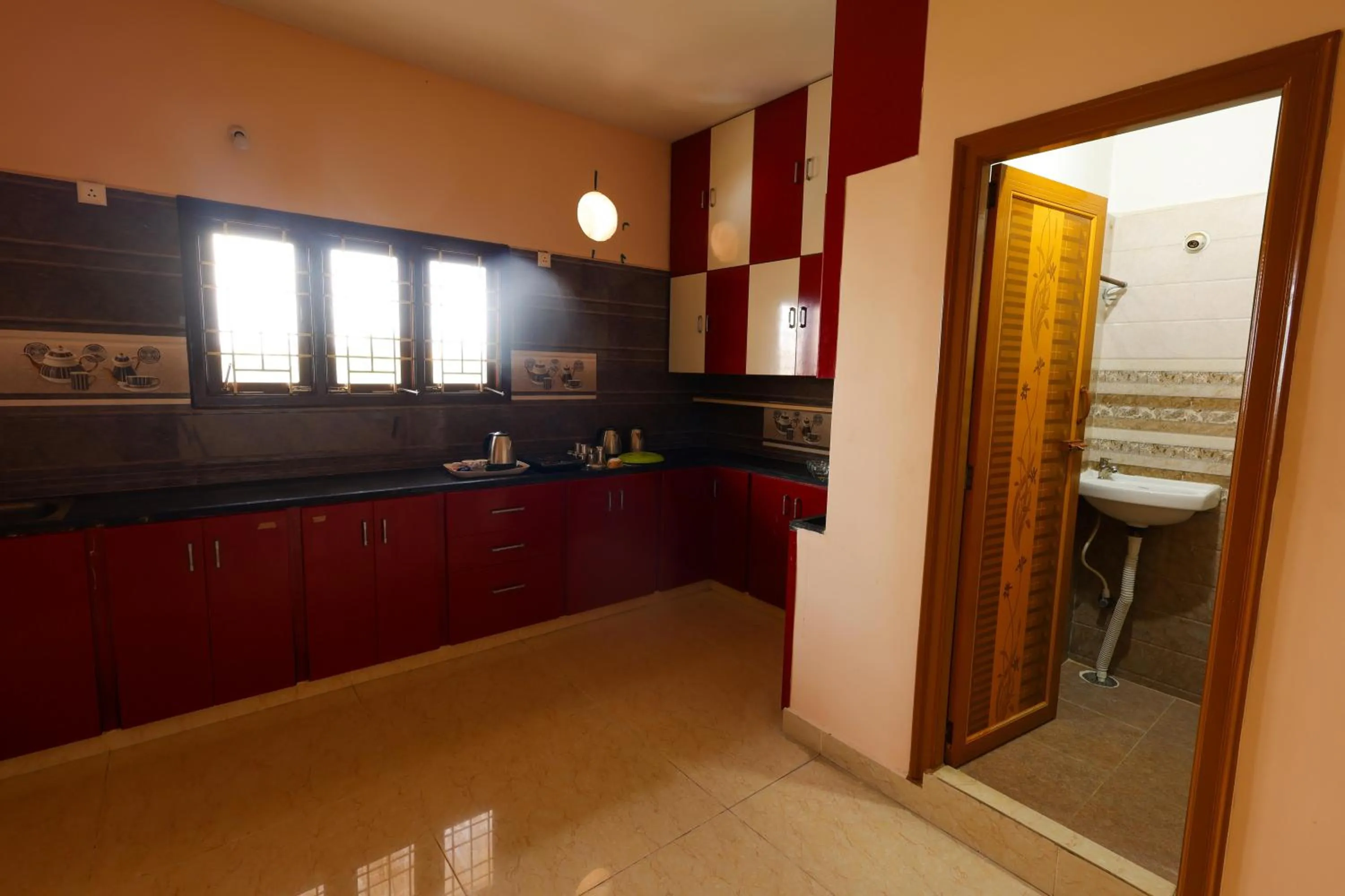 Kitchen or kitchenette in SBHS Homestay - Garudadri - Tirupati Bus Stand