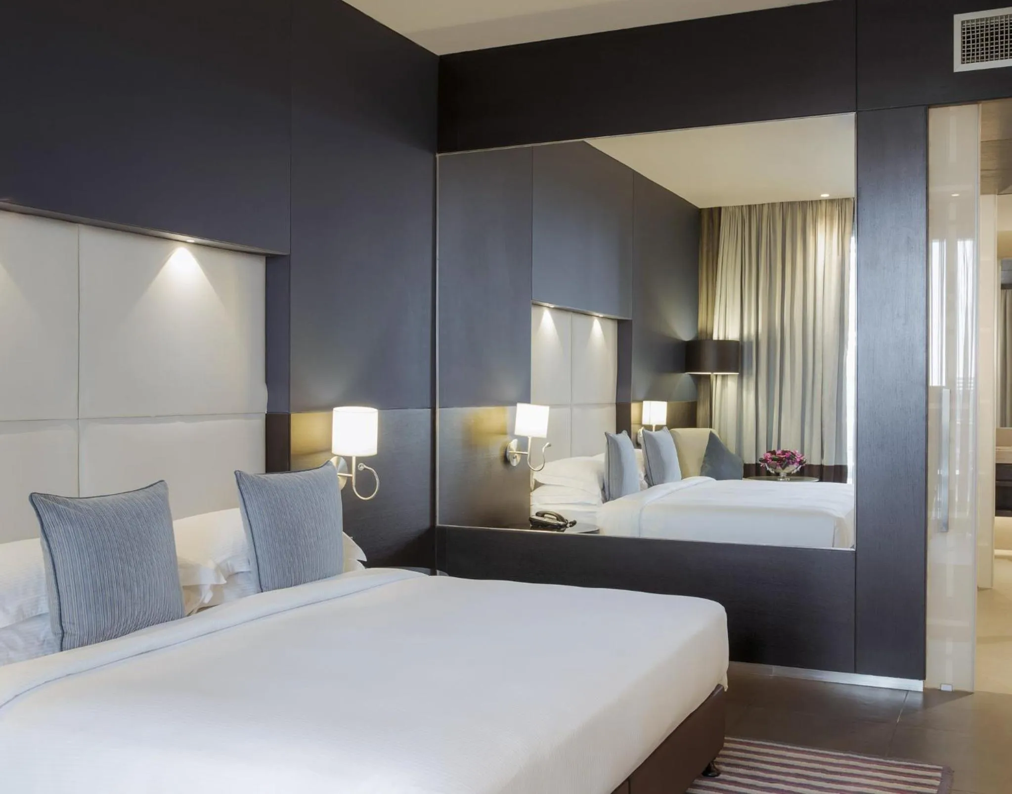 Photo of the whole room, Bed in The Abdali Boulevard Hotel