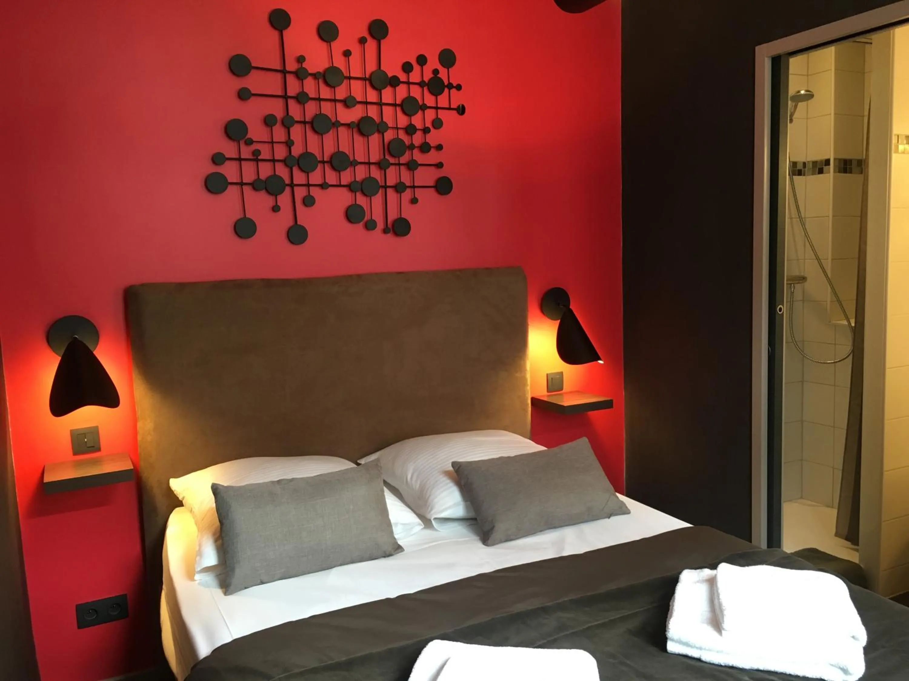 Bed in Le 84 Sainte-Cath'