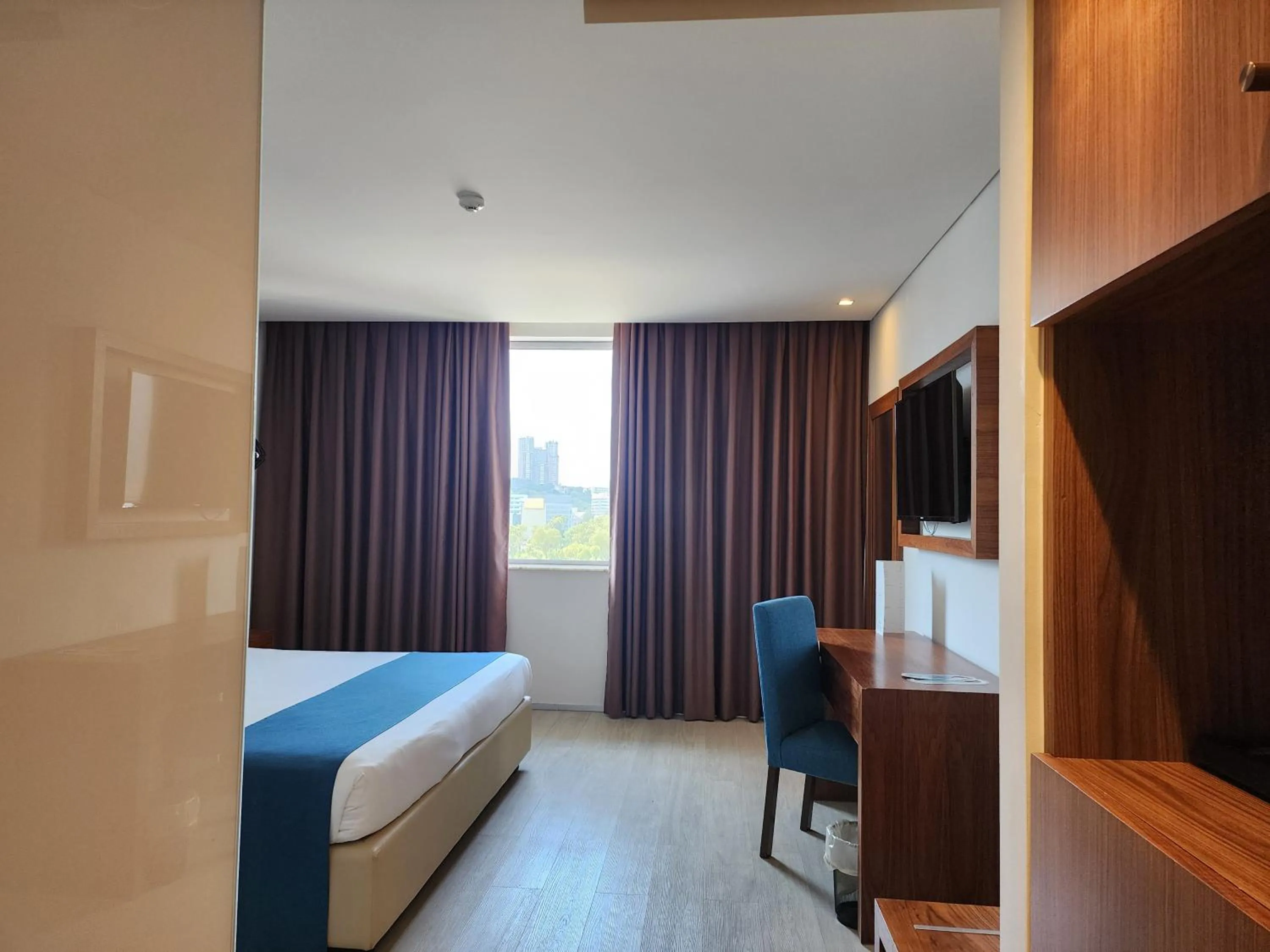 Bed in Afrin Prestige Hotel