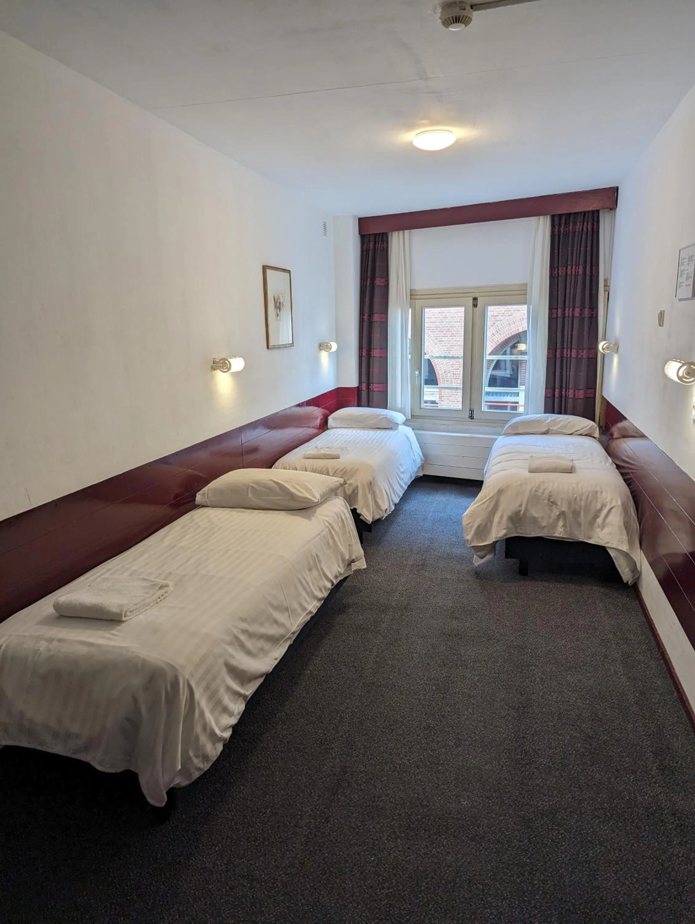 Bed in Budget Hotel Ben