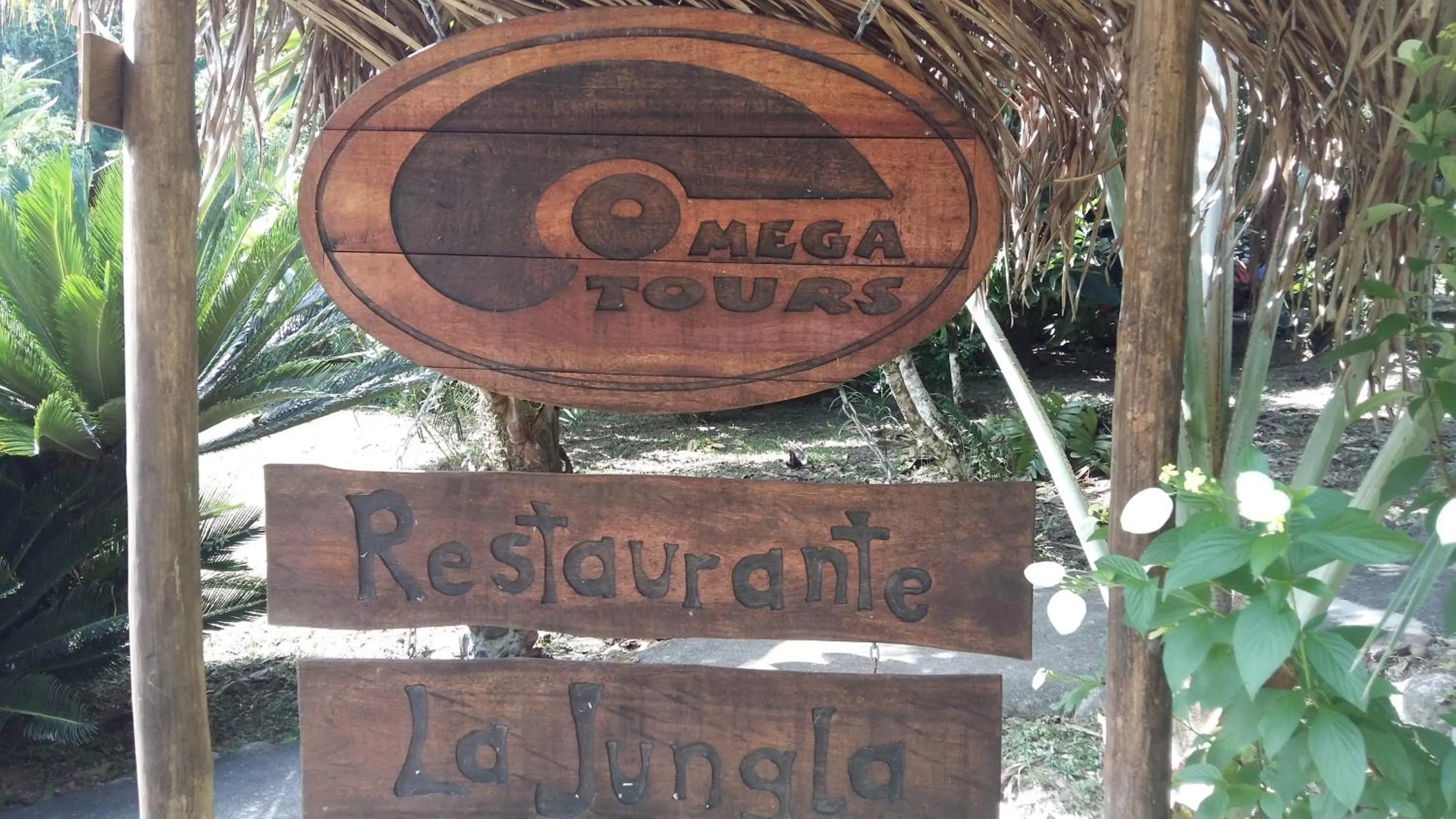 Property logo or sign in Omega Tours Eco-Jungle Lodge
