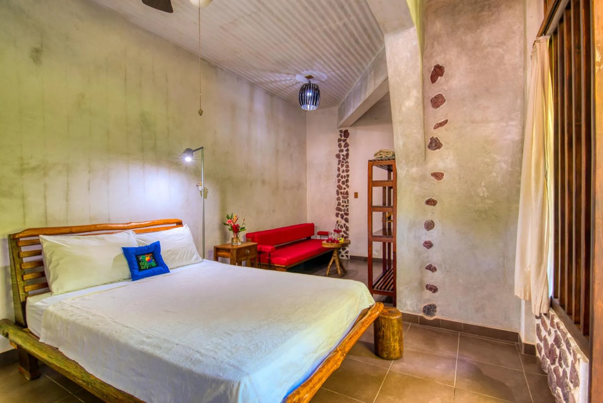 Bed in Omega Tours Eco-Jungle Lodge