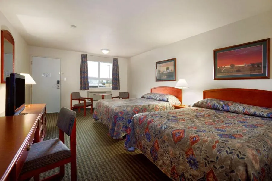 Bed in Travelodge Hotel by Wyndham Weyburn