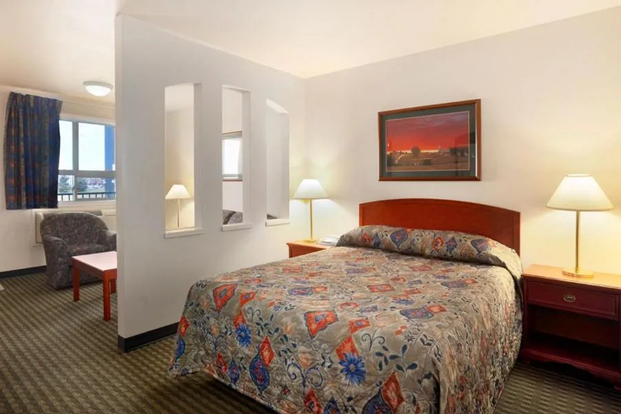 Bed in Travelodge Hotel by Wyndham Weyburn