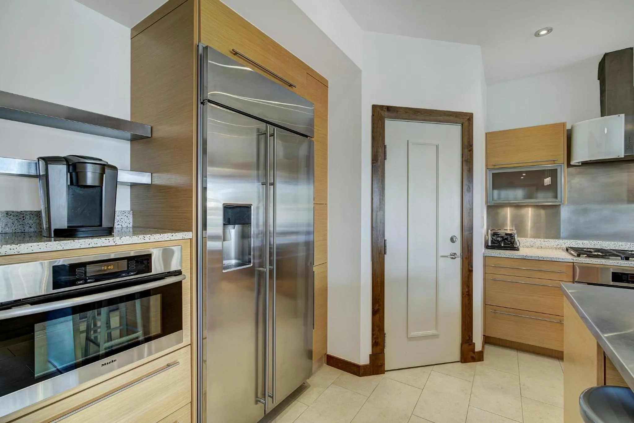 Communal kitchen in The Osprey at Beaver Creek, a RockResort