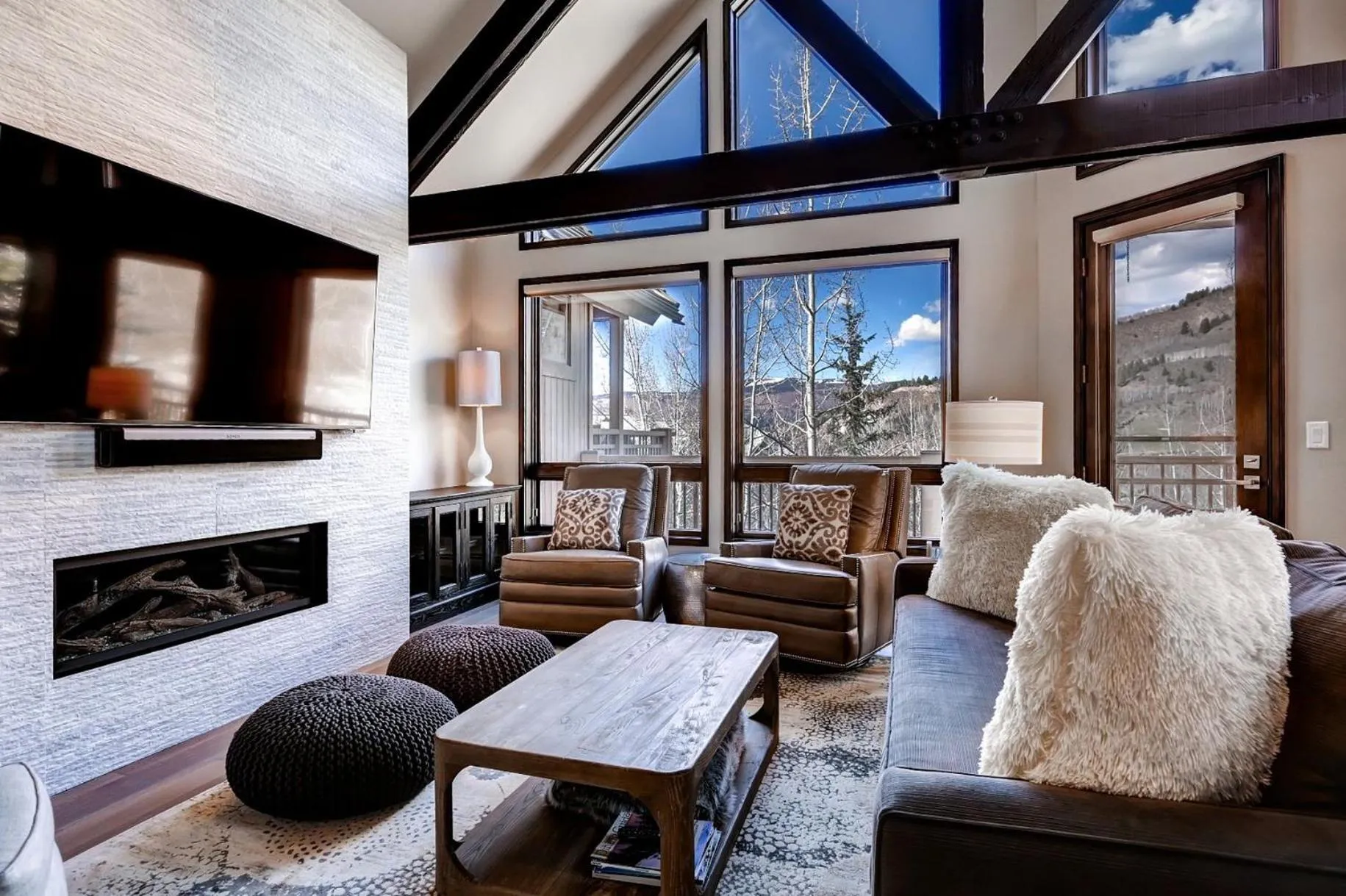 Living room in The Pines Lodge, a RockResort, by Vail Resorts