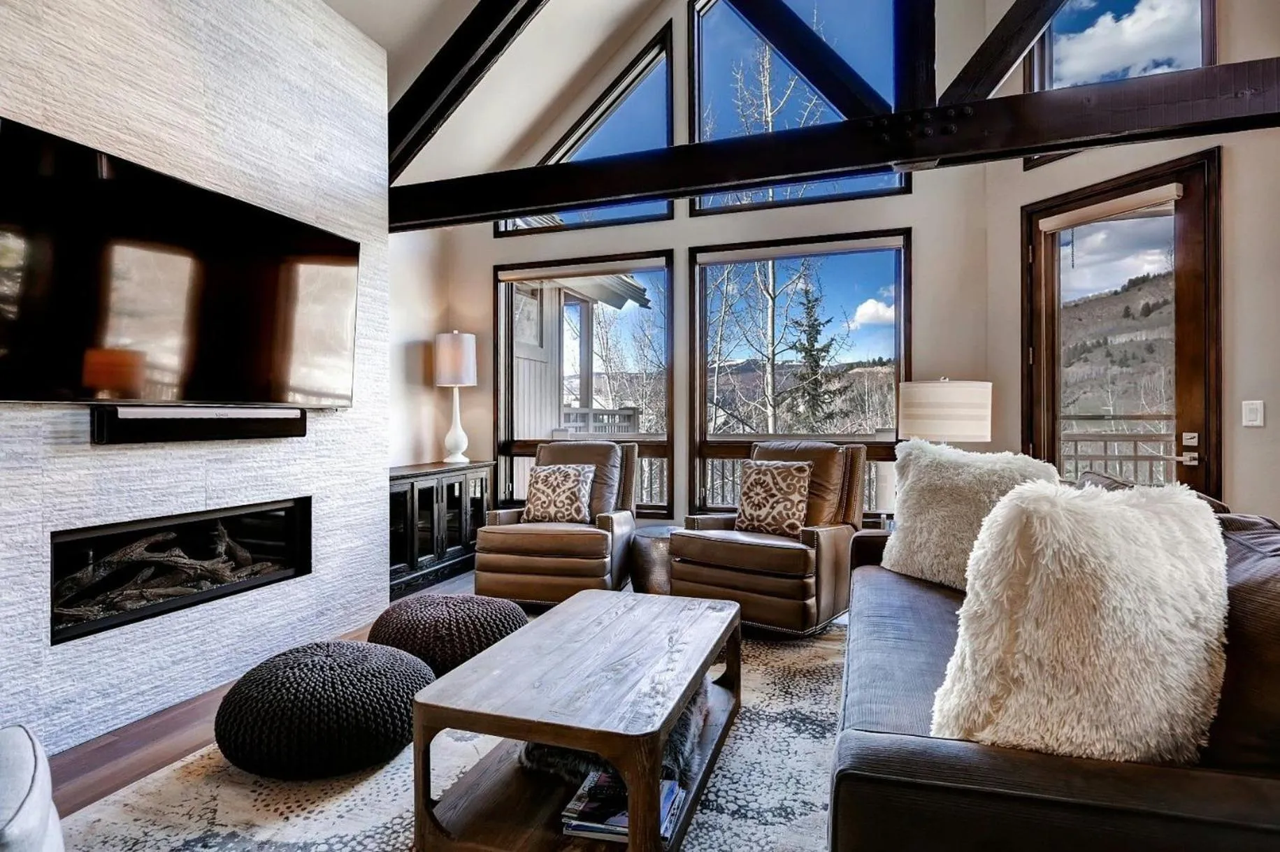 Living room in The Pines Lodge, a RockResort, by Vail Resorts