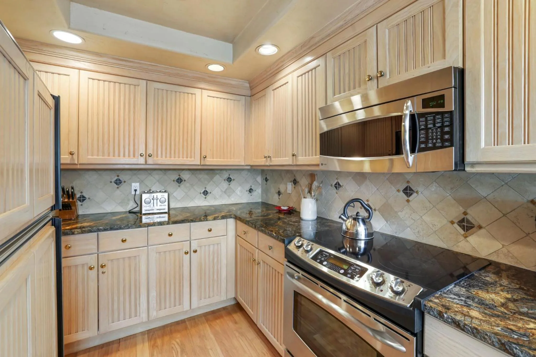 Communal kitchen in The Pines Lodge, a RockResort, by Vail Resorts