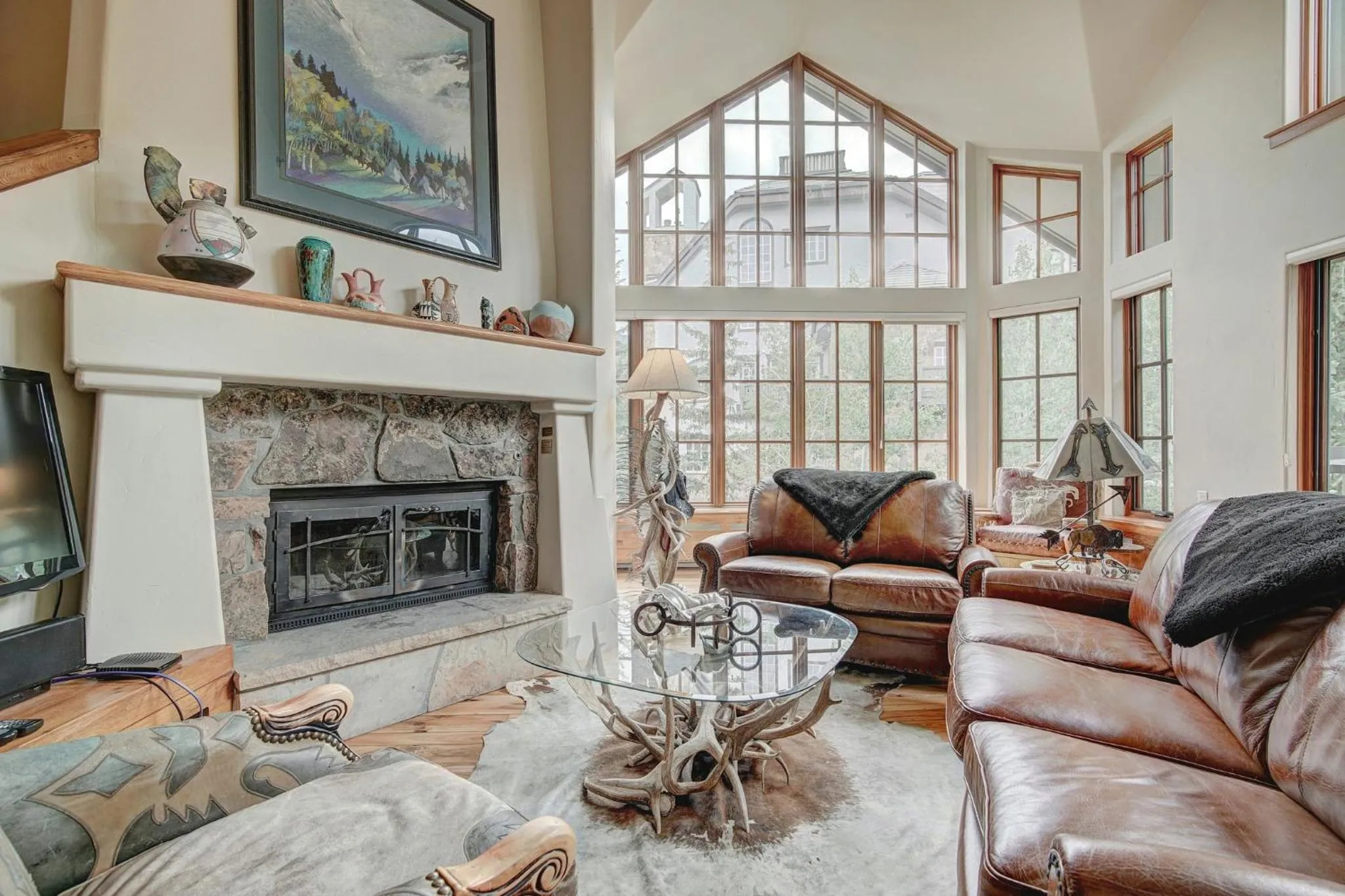 Living room in The Pines Lodge, a RockResort, by Vail Resorts