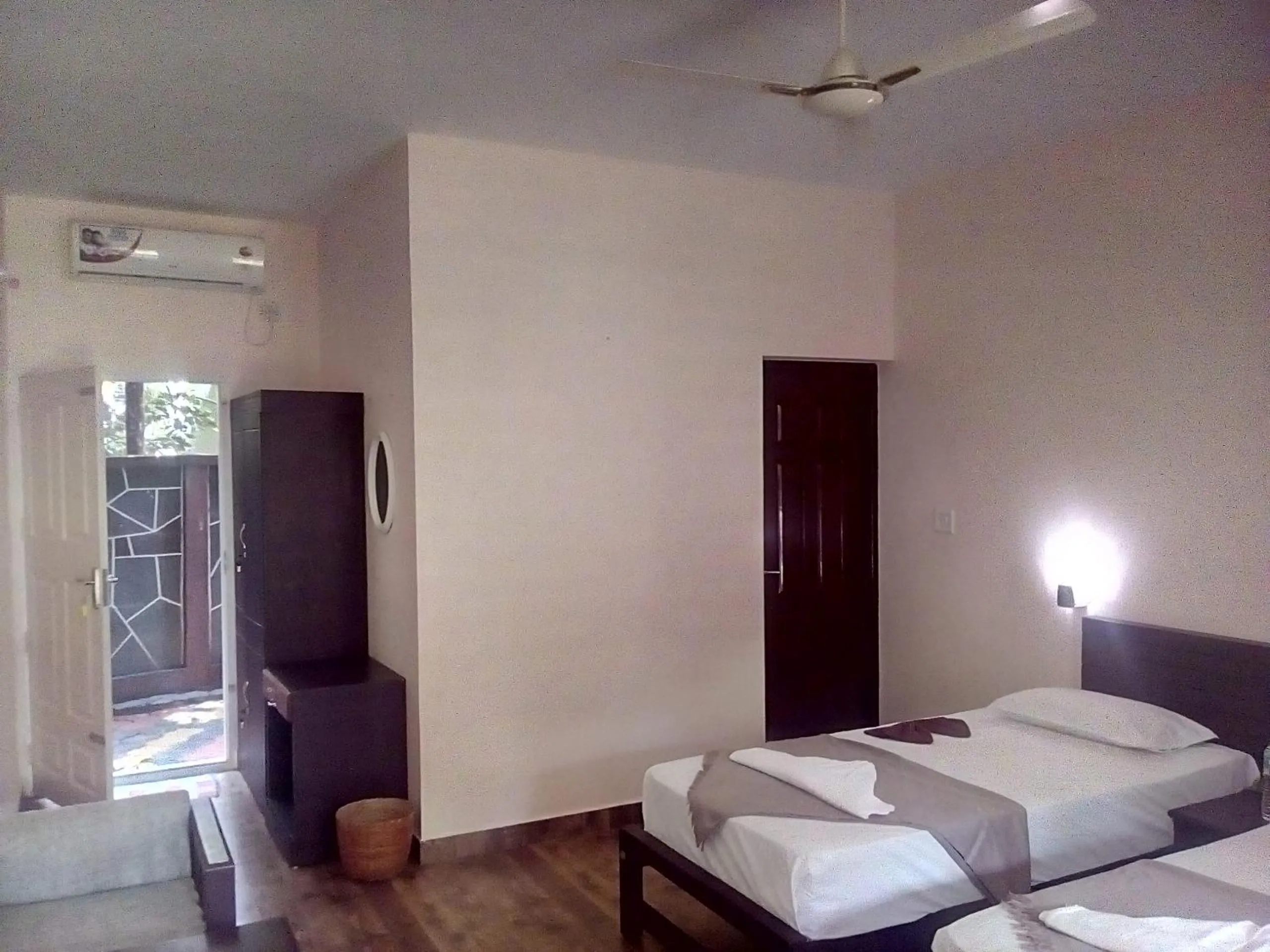 Photo of the whole room, Bed in Elephant Pass Ayurveda & Yoga Retreat