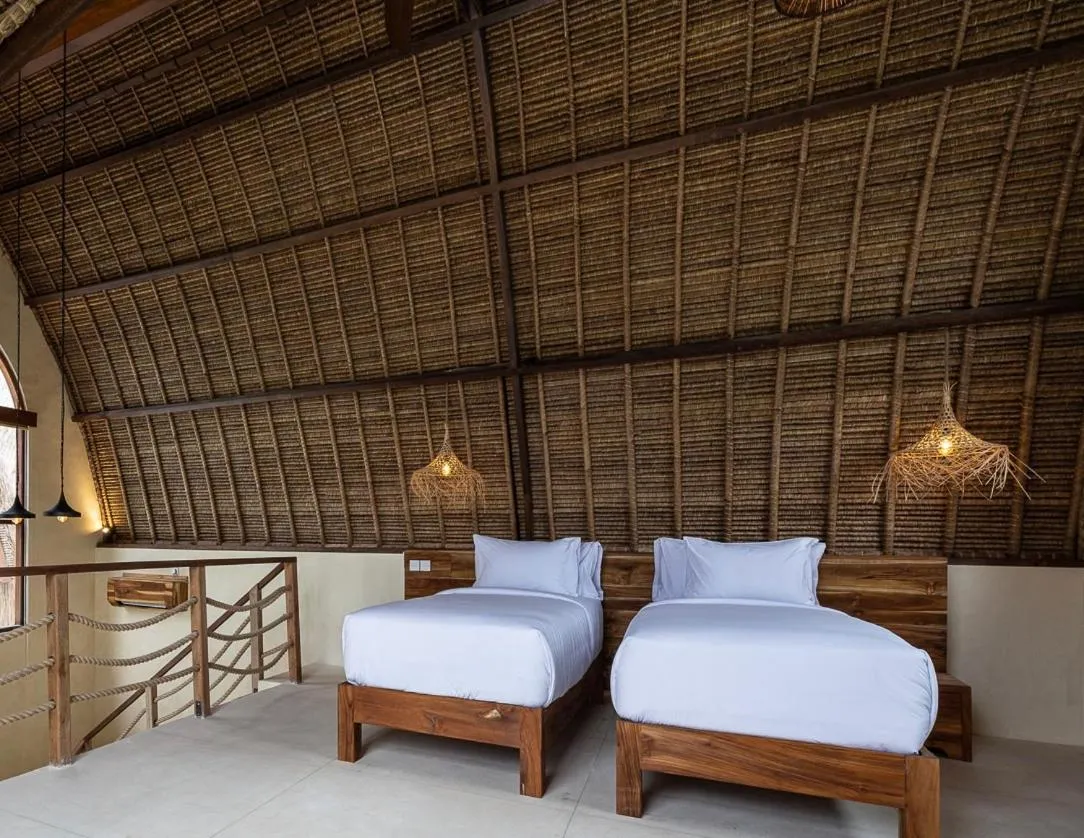 Bed in Lulu's Villas