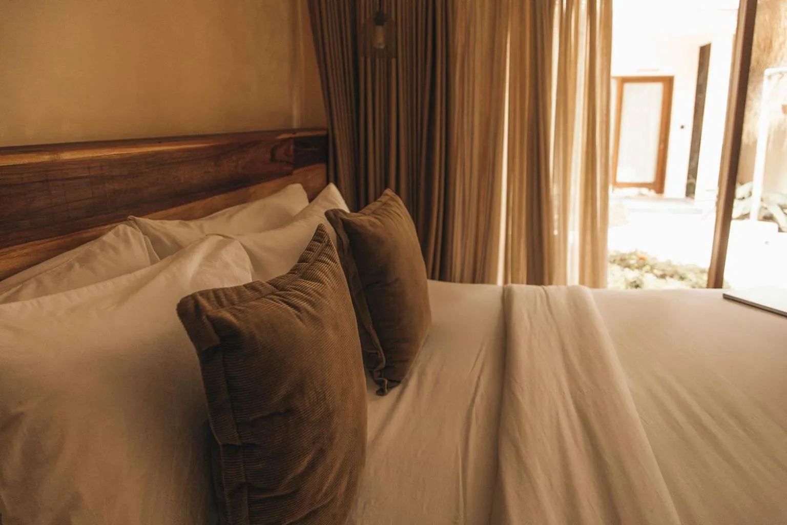 Bed in Lulu's Villas