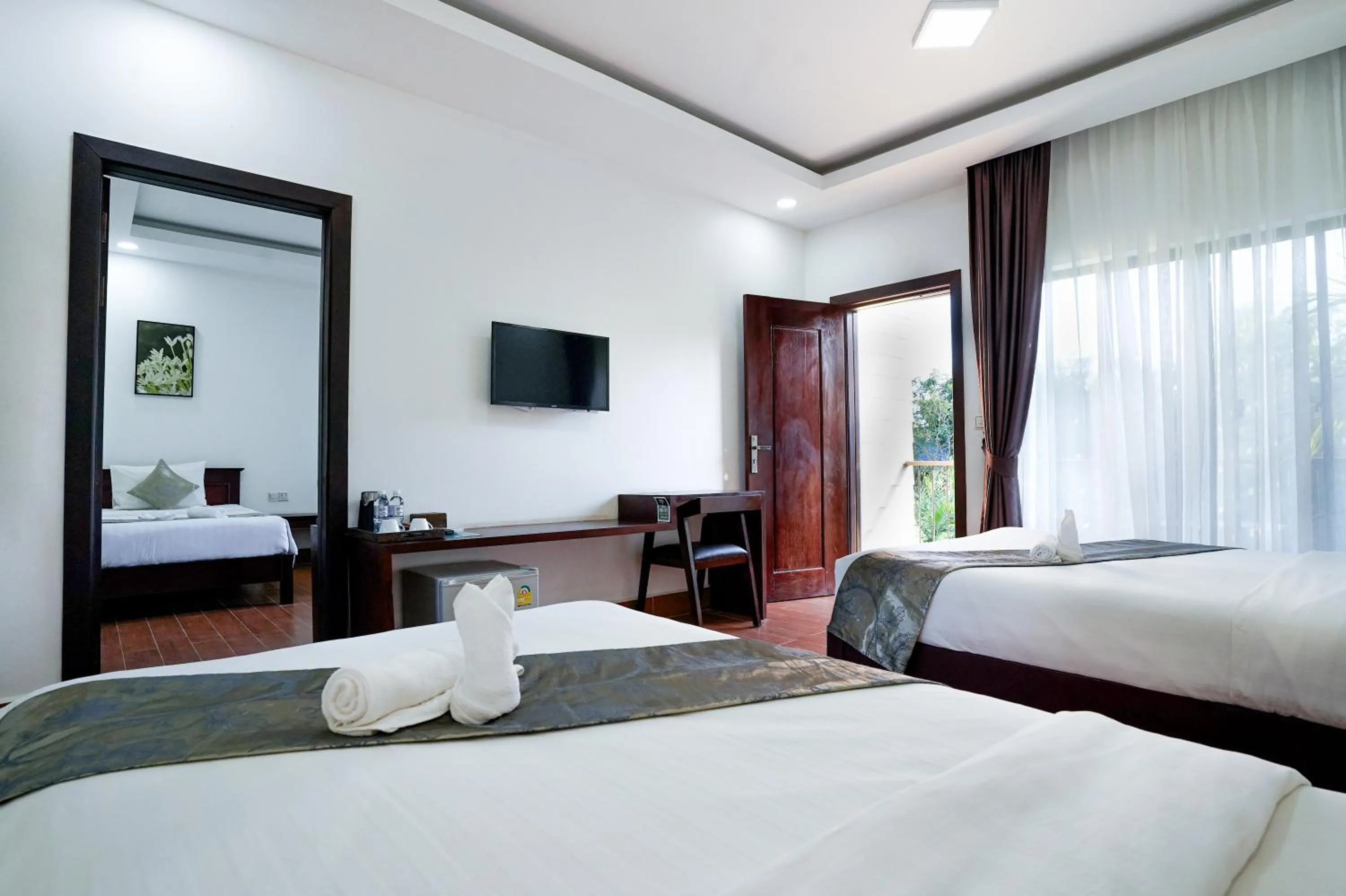 Bed in Angkearboss Villa