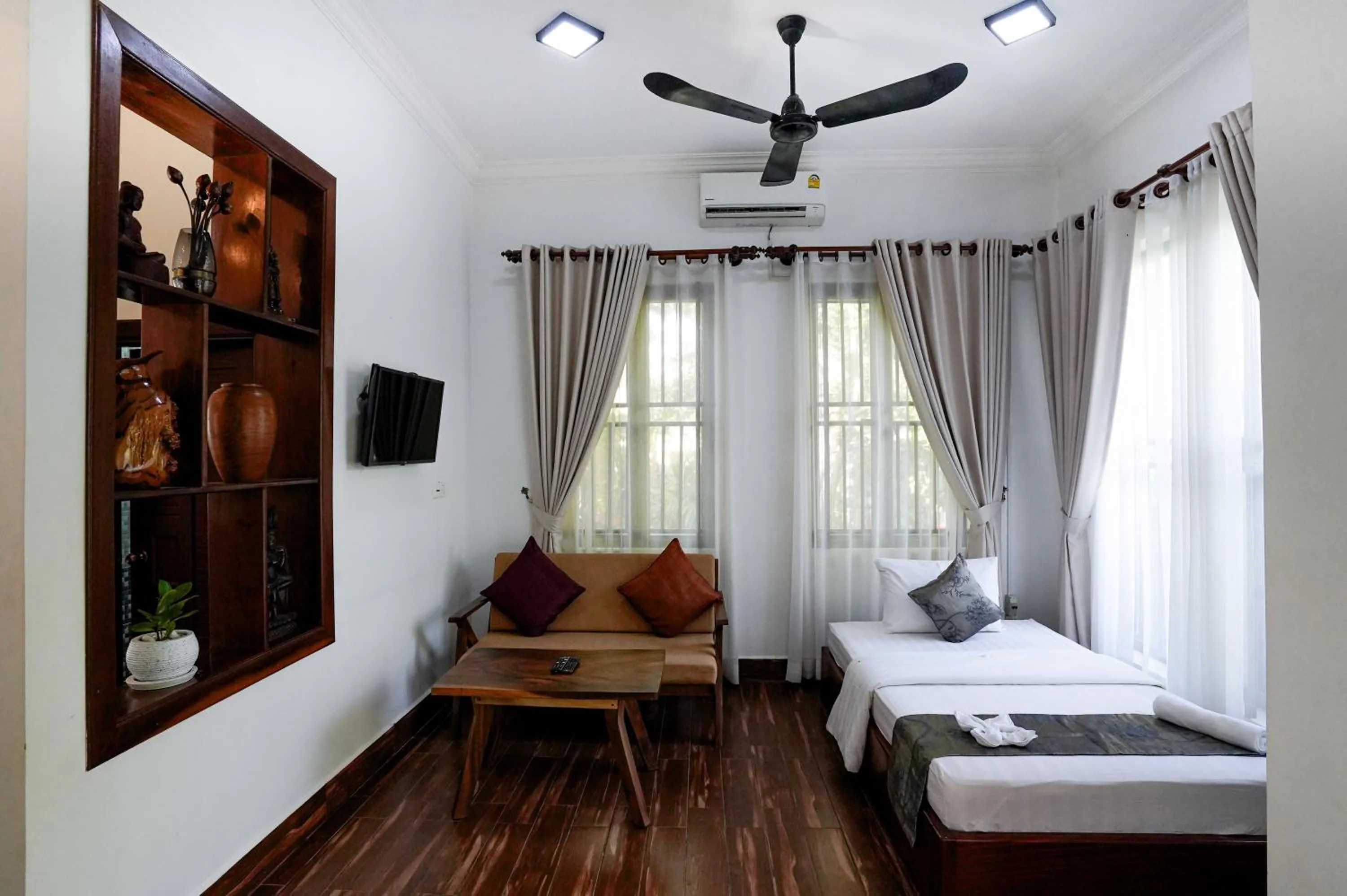 Bed in Angkearboss Villa