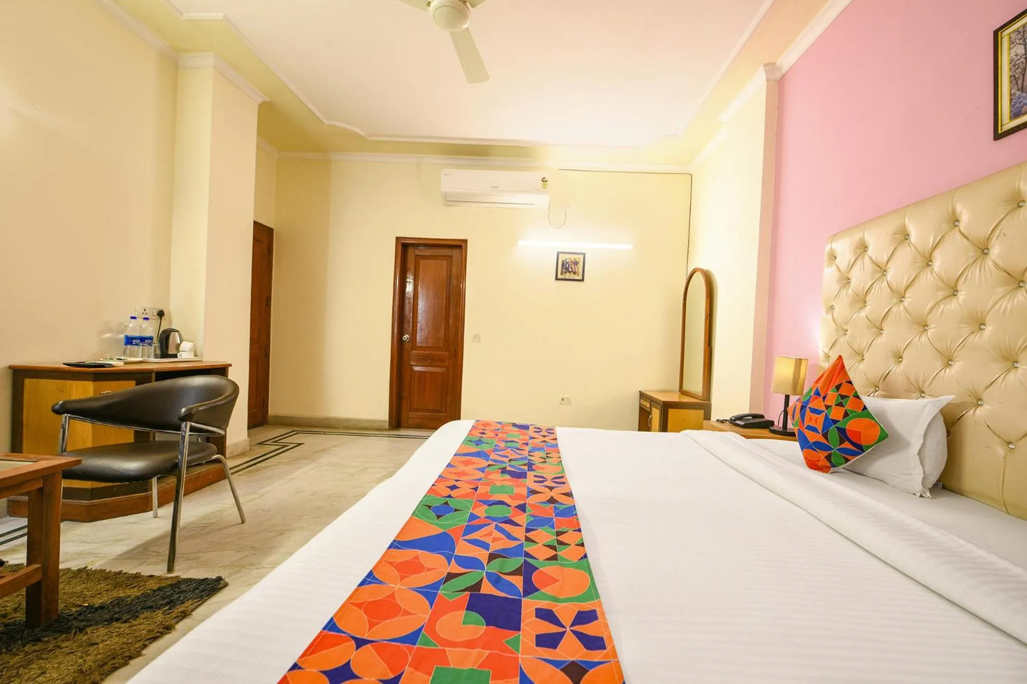 Bed in FabHotel Gracious Inn