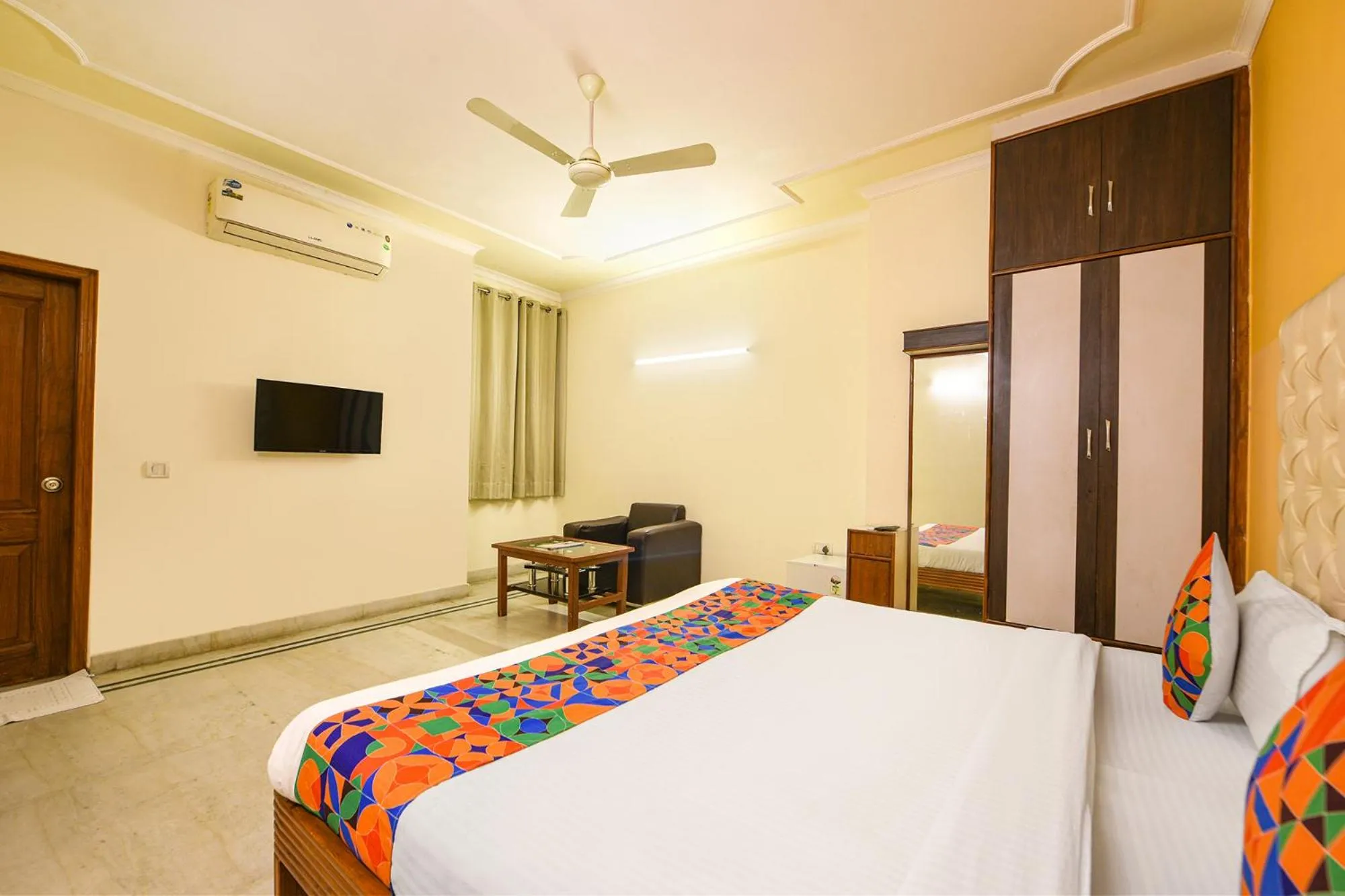 Bed in FabHotel Gracious Inn