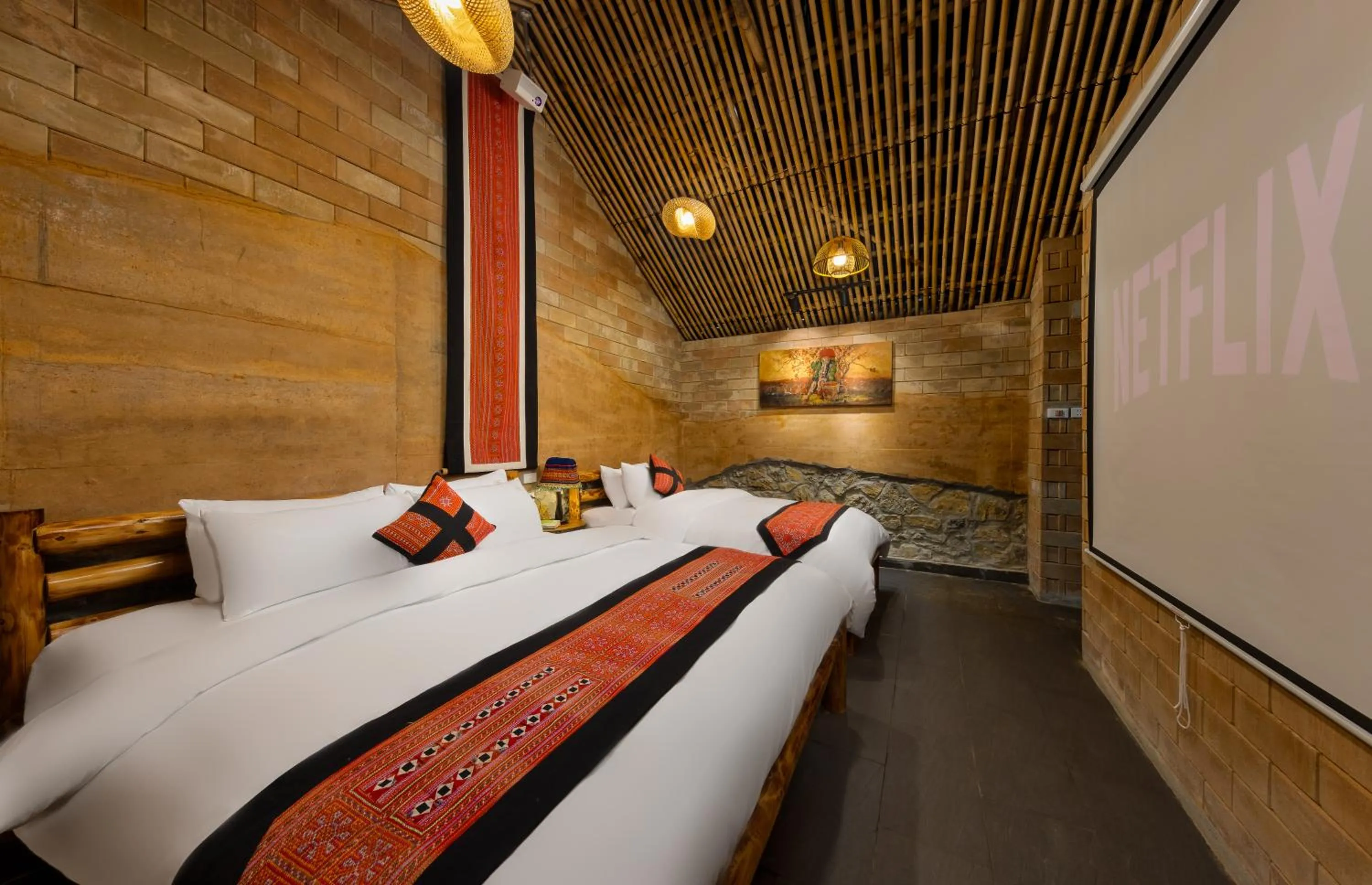 Bed in Sapaxa Spring Garden Ecolodge