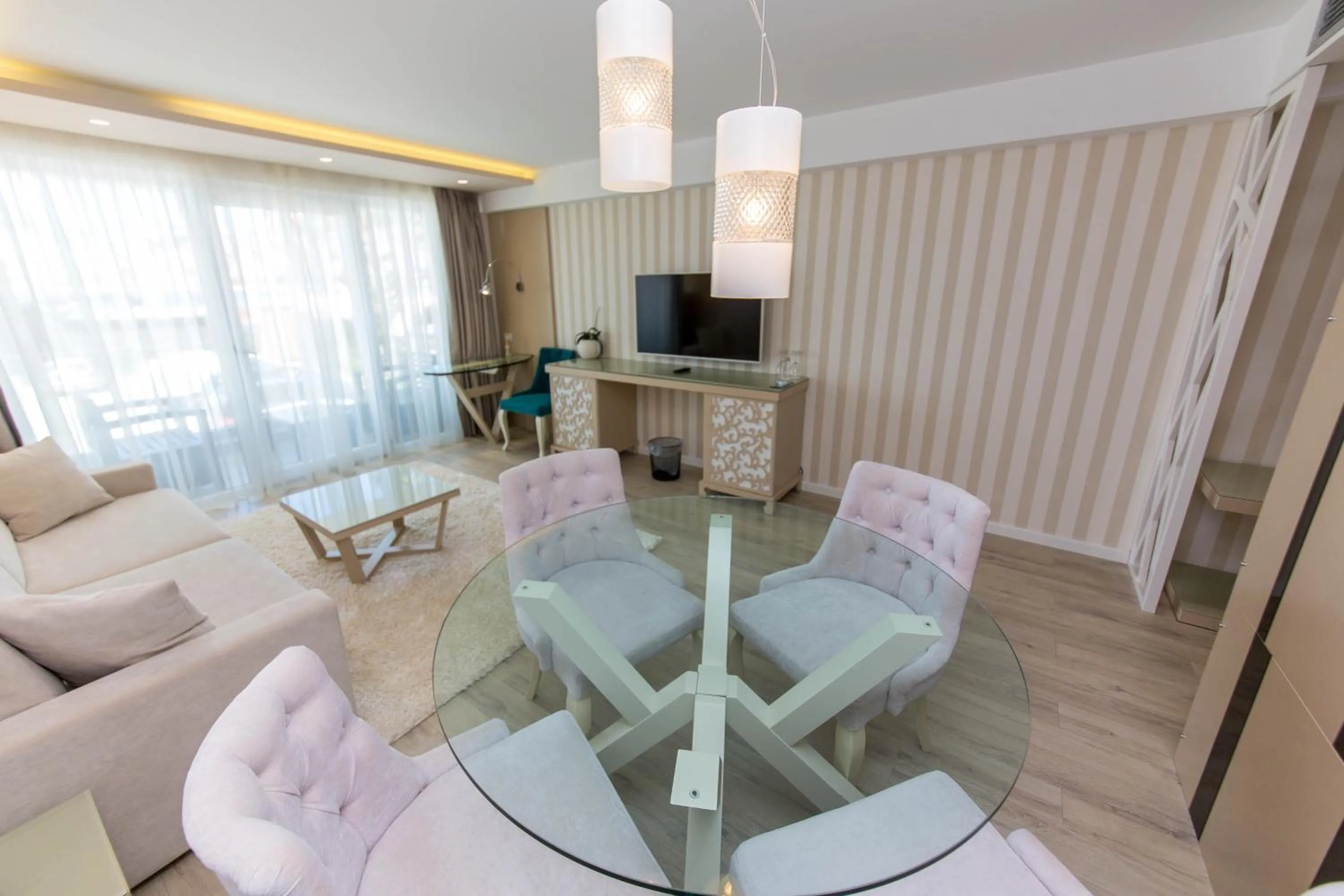 Communal lounge/ TV room in Demi Hotel