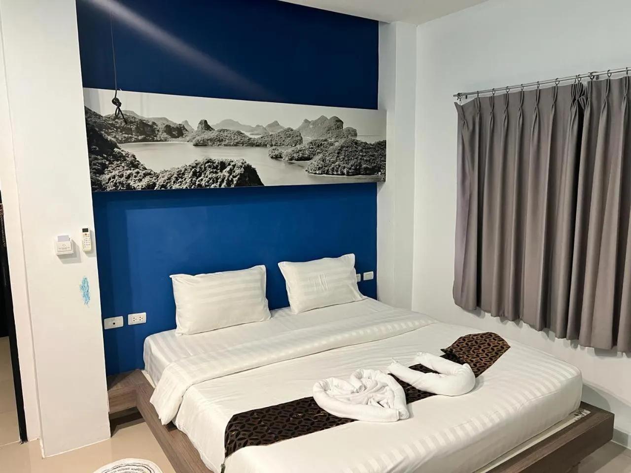 Photo of the whole room, Bed in Hotel The Journey Patong New