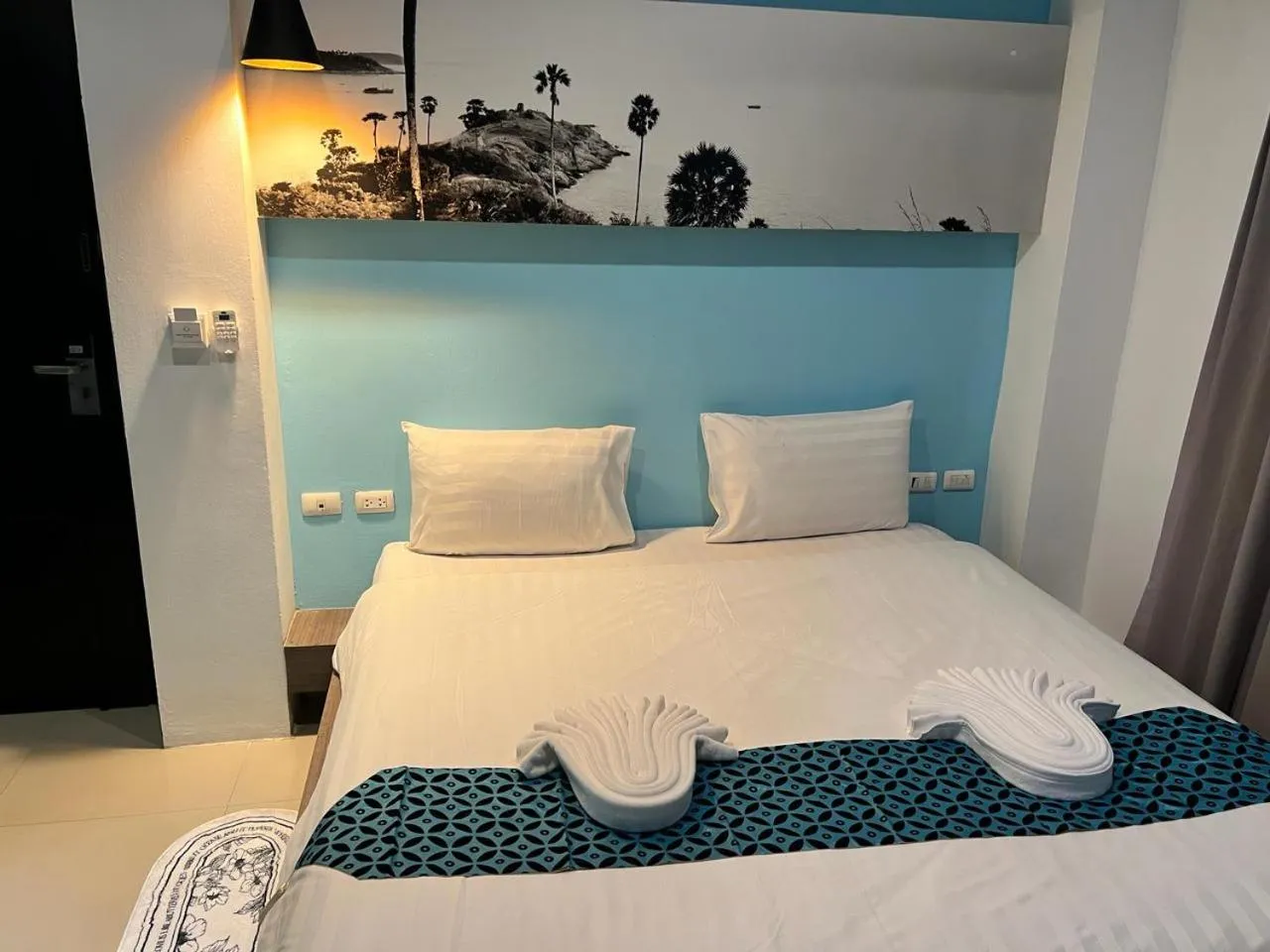 Photo of the whole room, Bed in Hotel The Journey Patong New