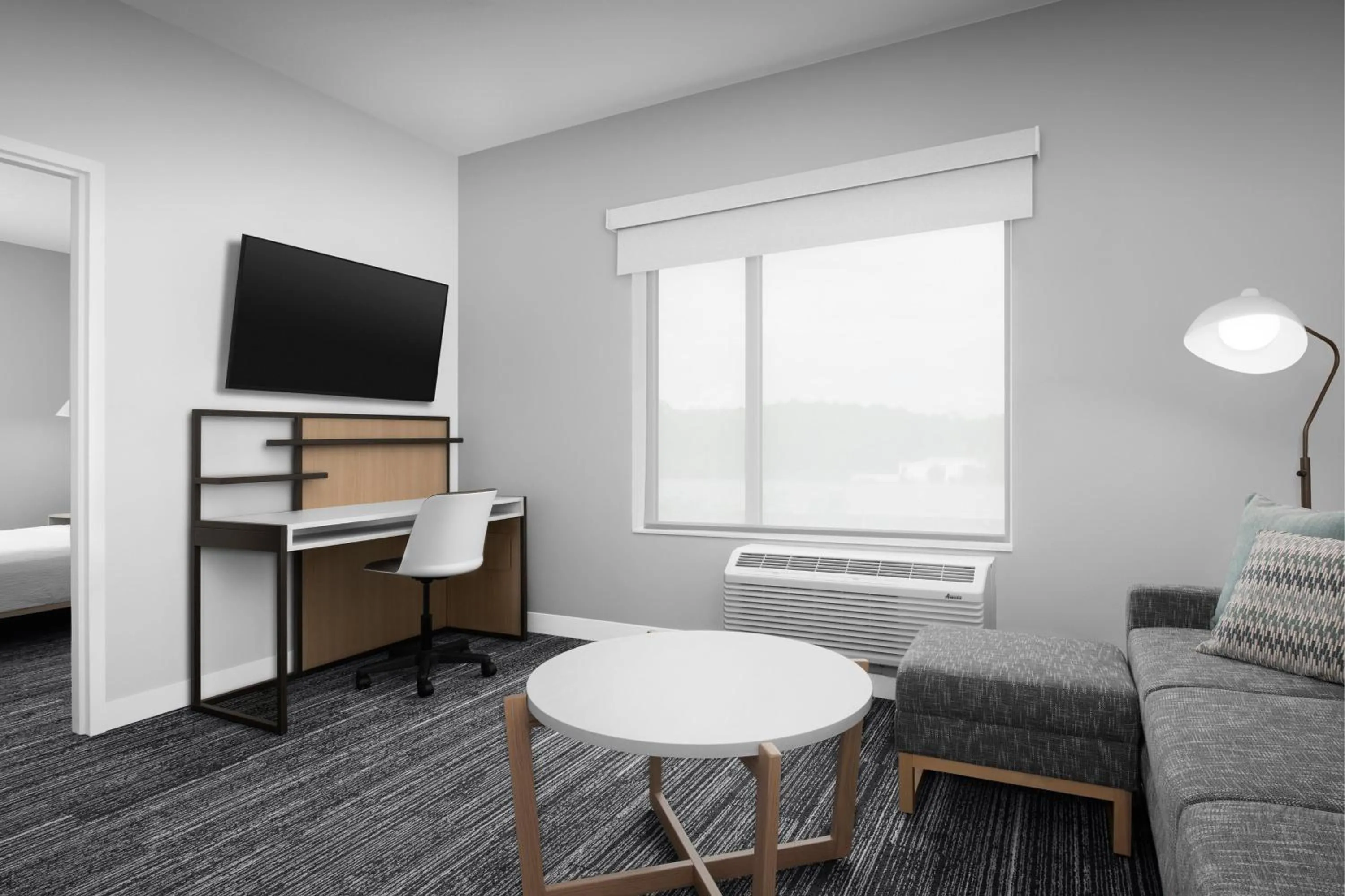 Living room, Bed in TownePlace Suites Jacksonville Airport