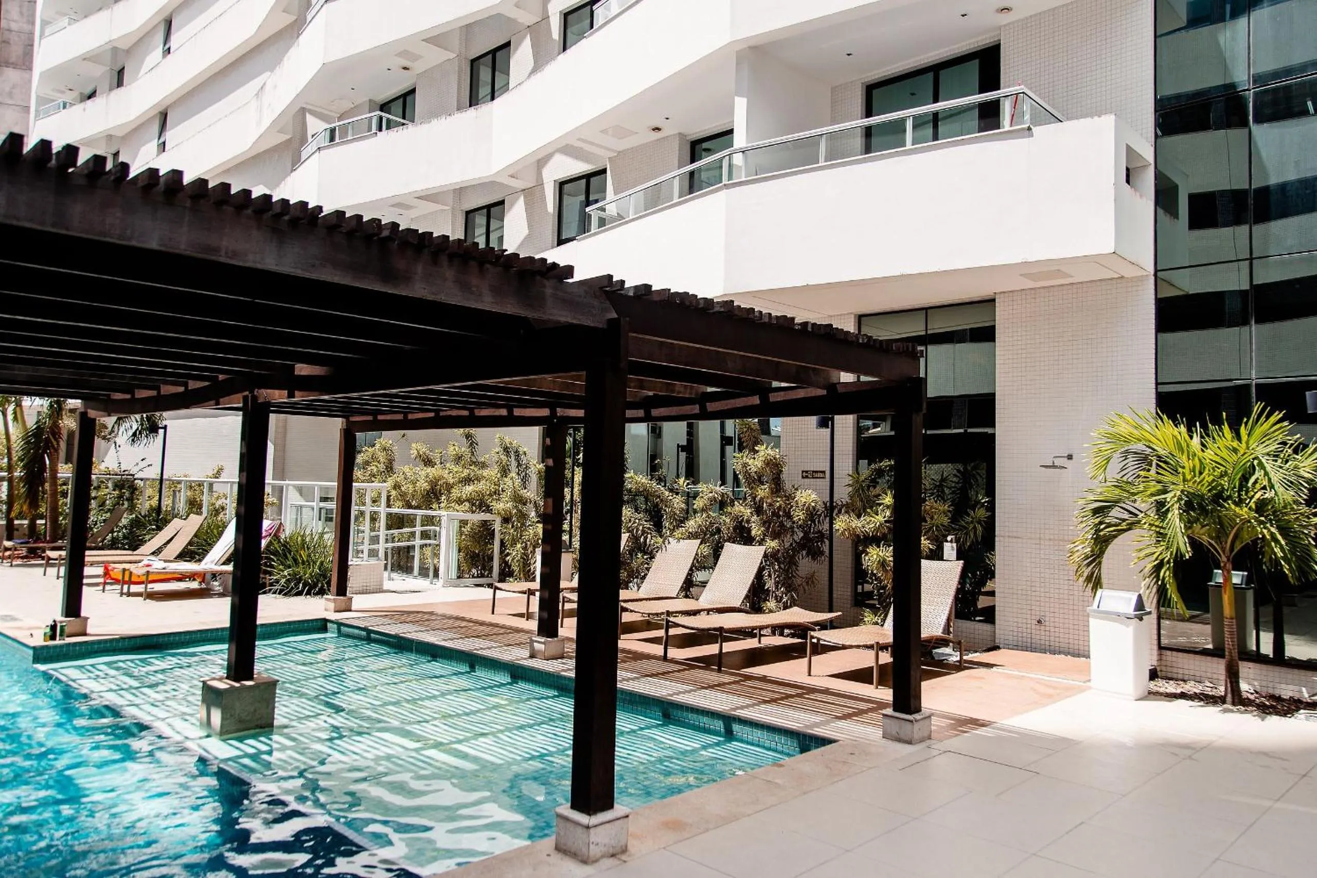 Swimming pool in Mondial Apartments By BnbHost