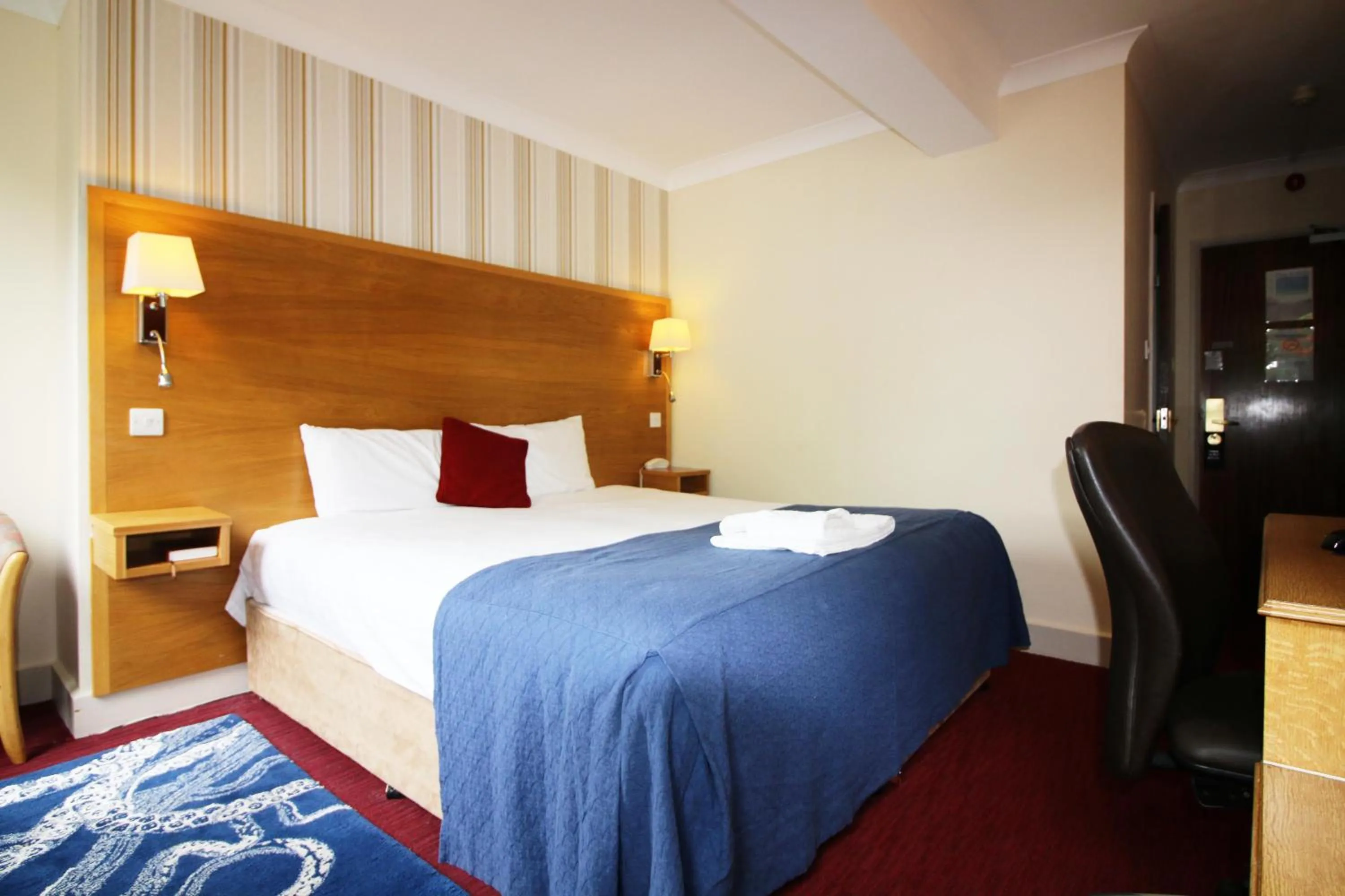 Bed in Westone Manor Hotel