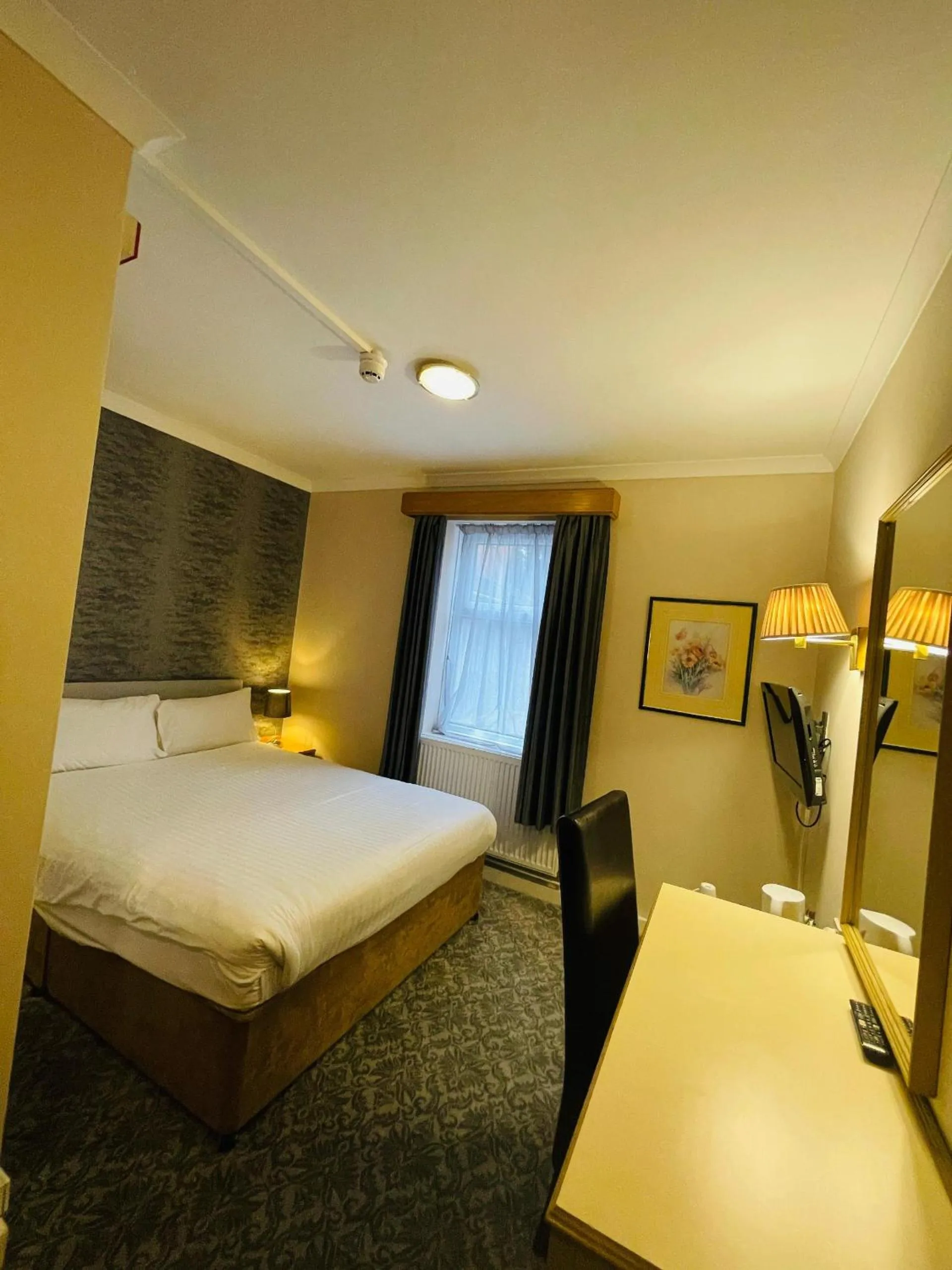 Bed in Westone Manor Hotel