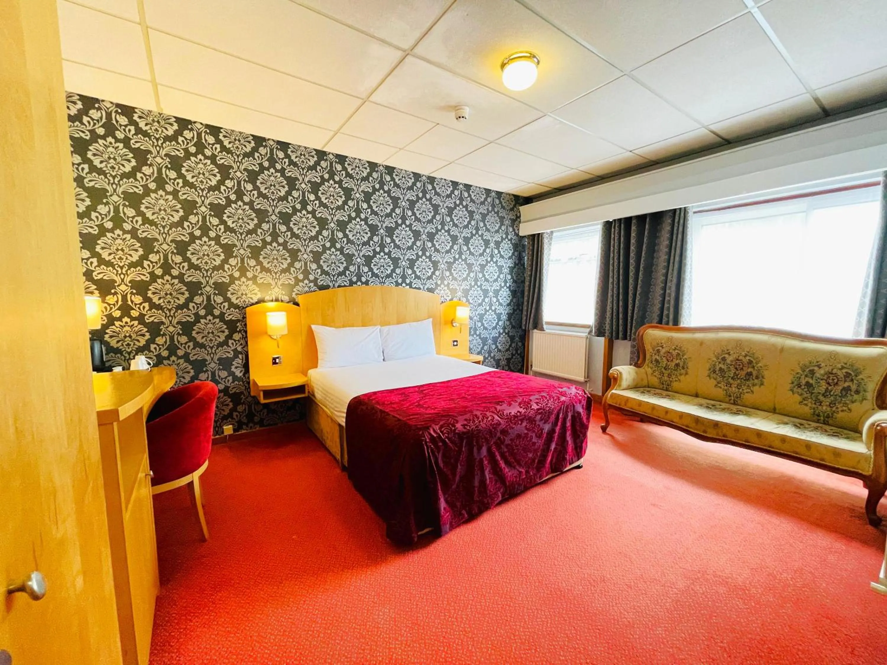 Bed in Westone Manor Hotel