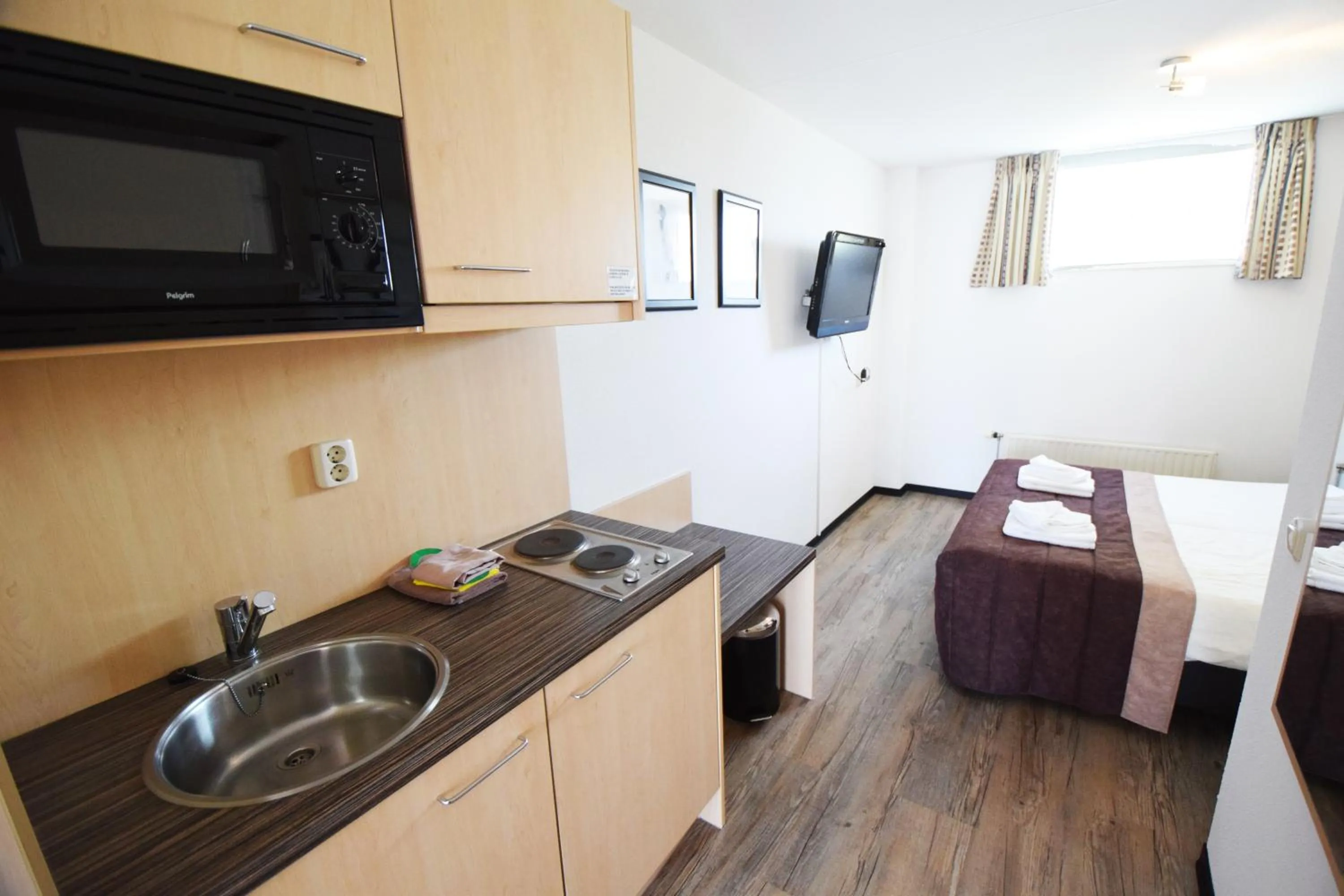 Kitchen or kitchenette in Hotel Noordzee