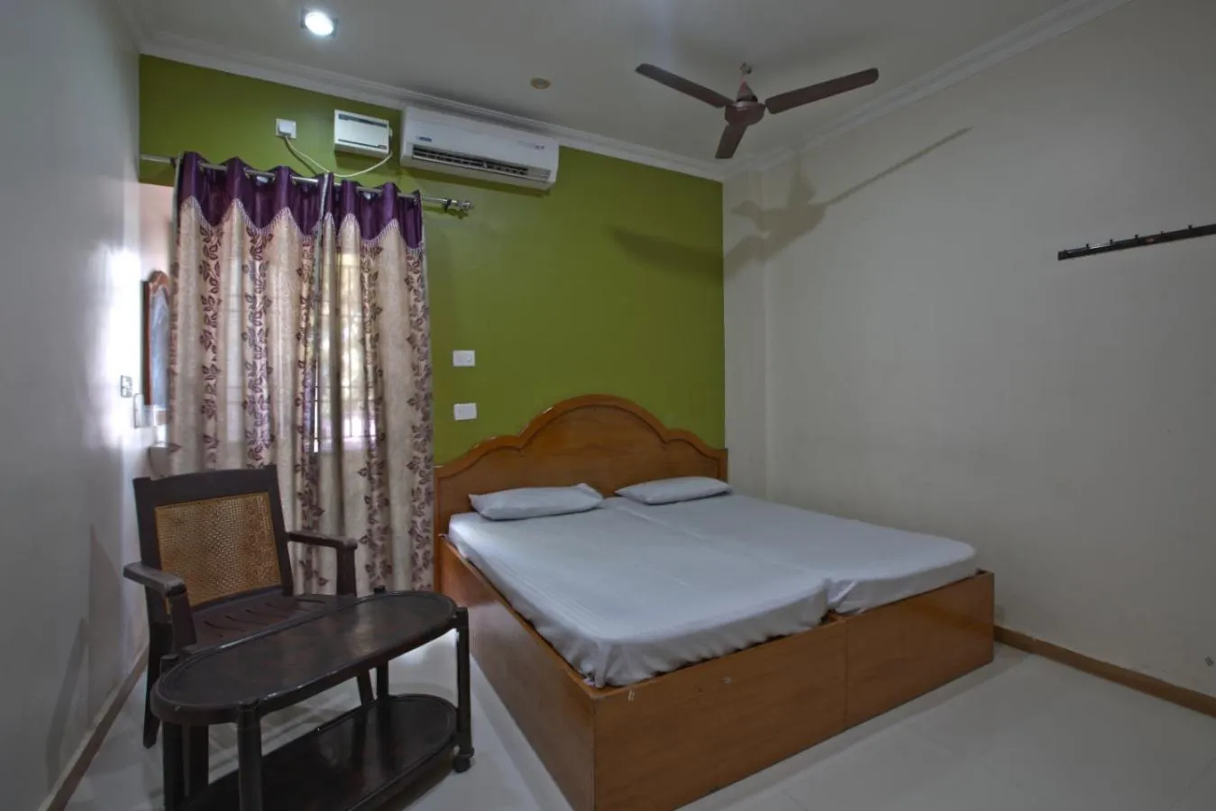 Bed in JAYA BHARATHI LODGE