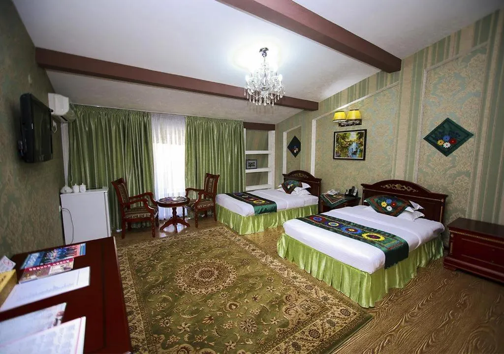 Bed in ORIYO DUSHANBE HOTEL
