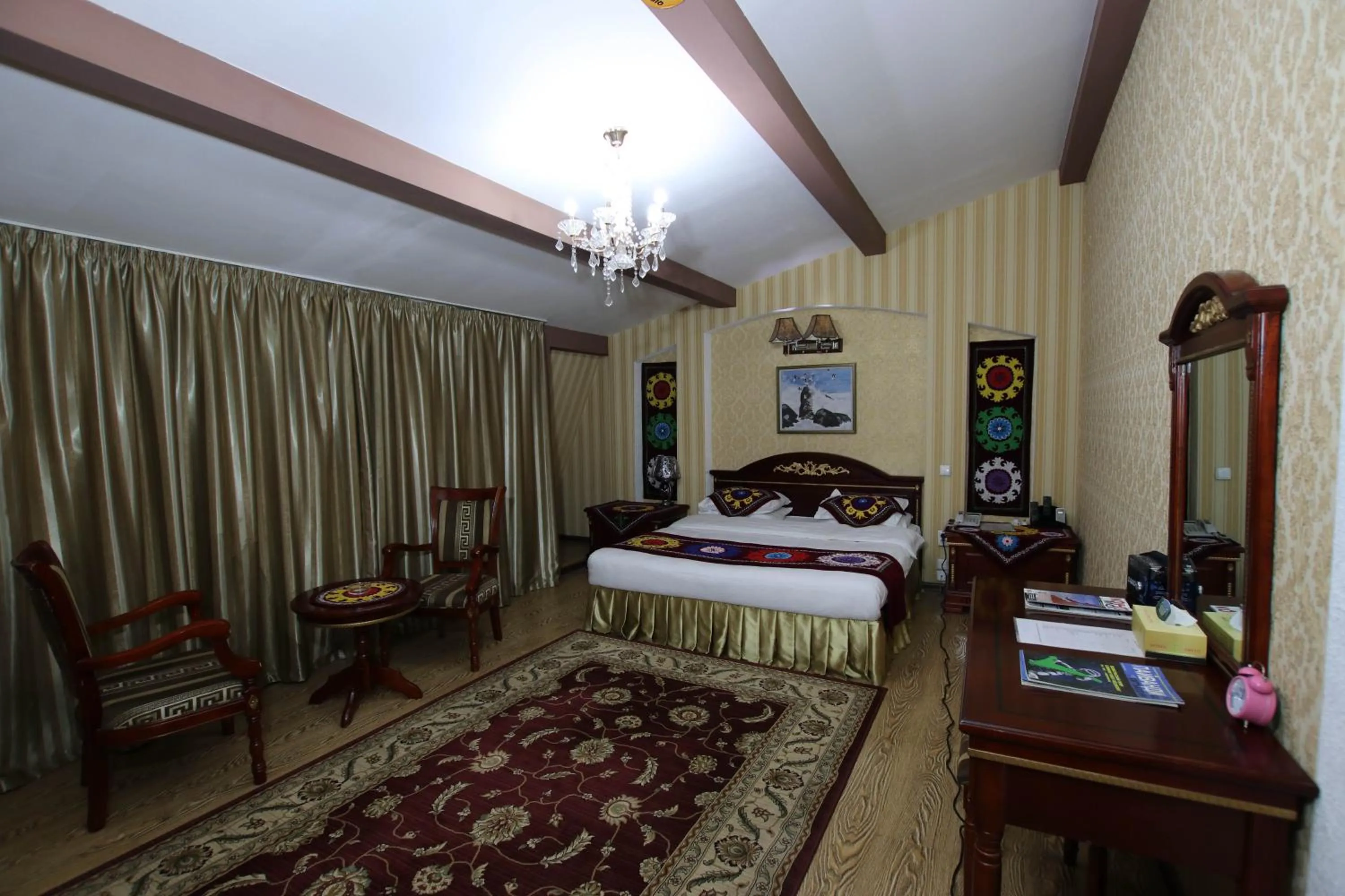 Bed in ORIYO DUSHANBE HOTEL