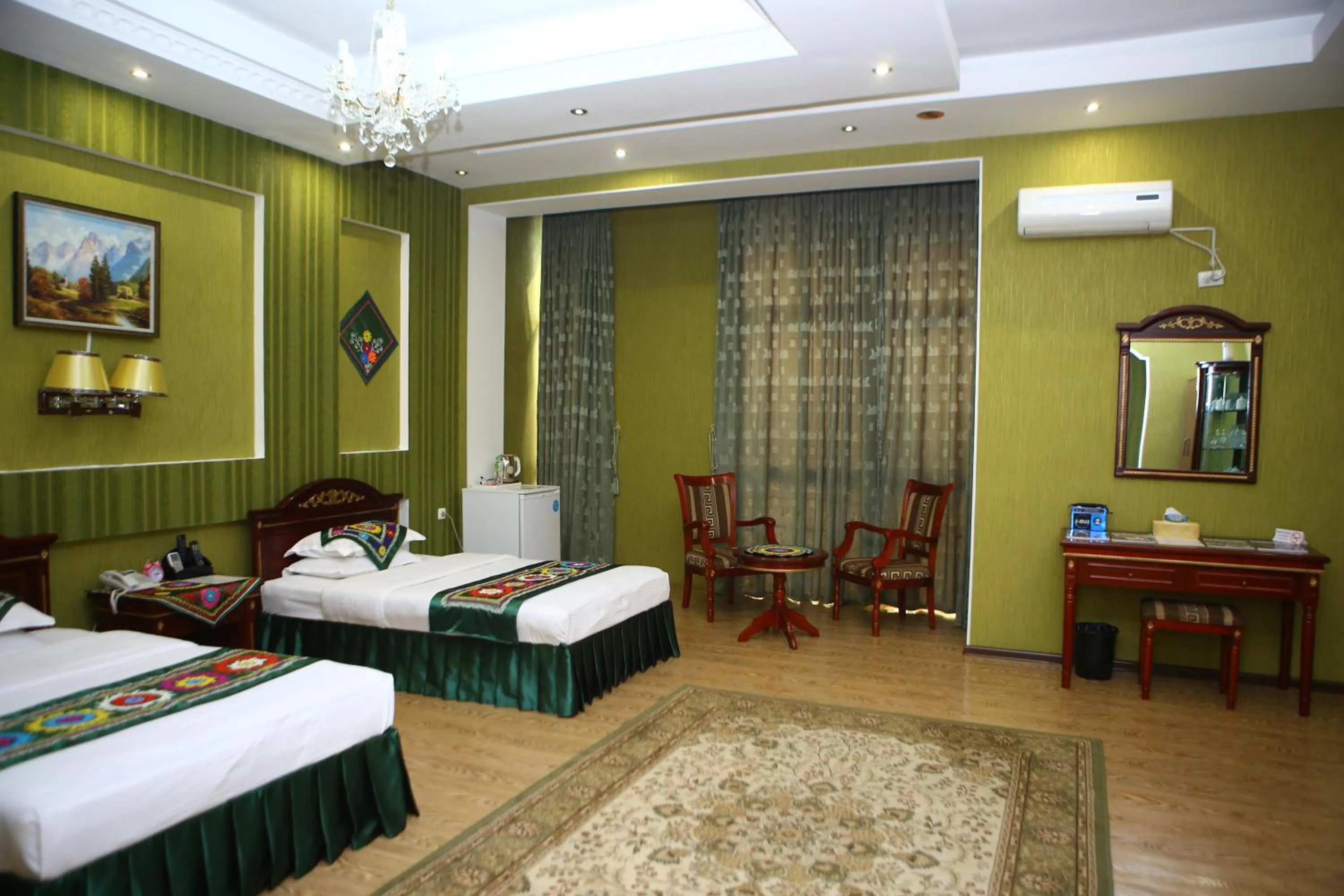 Bed in ORIYO DUSHANBE HOTEL