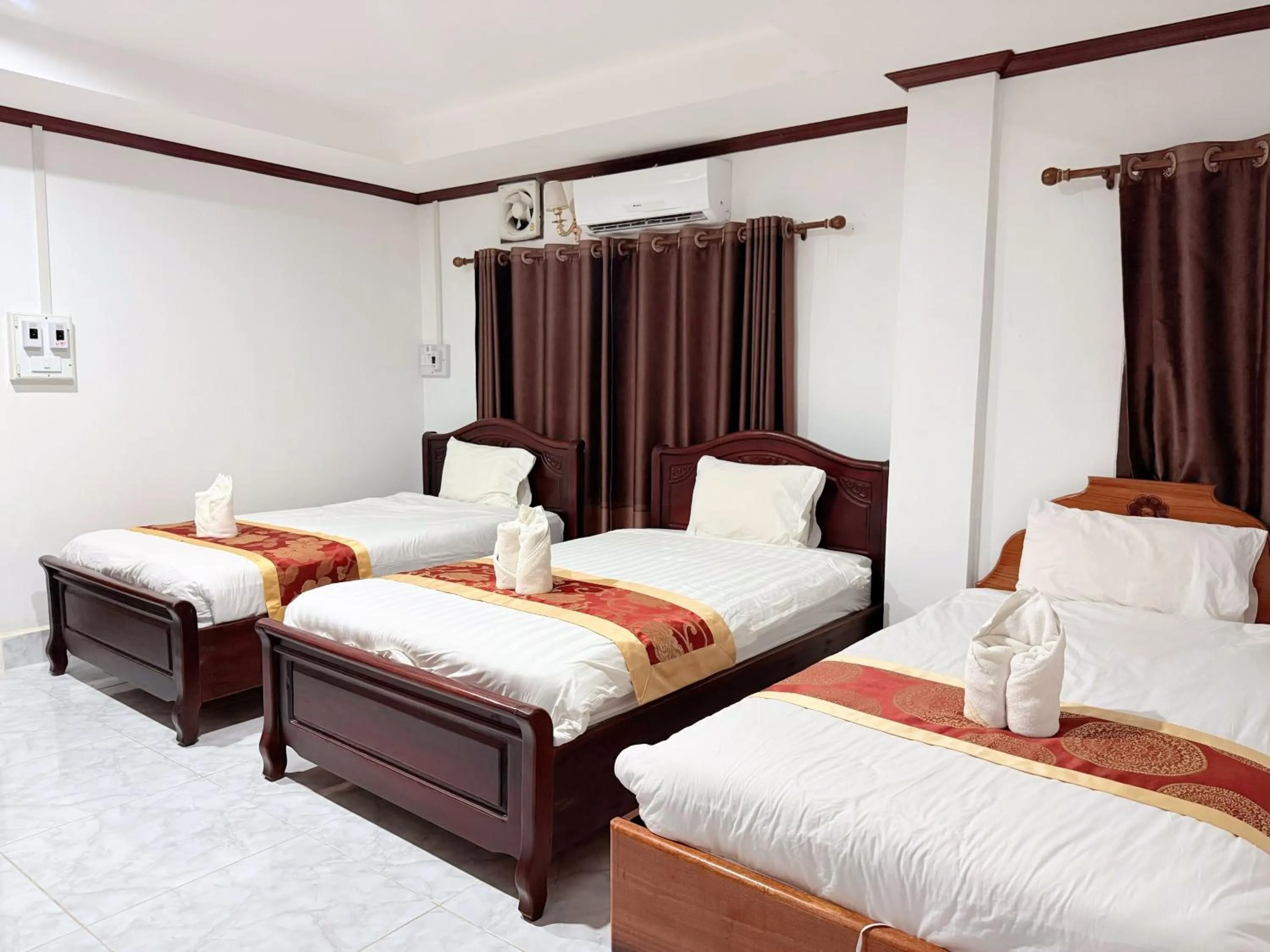 Bed in Vangvieng Sisavang Mountain View Hotel