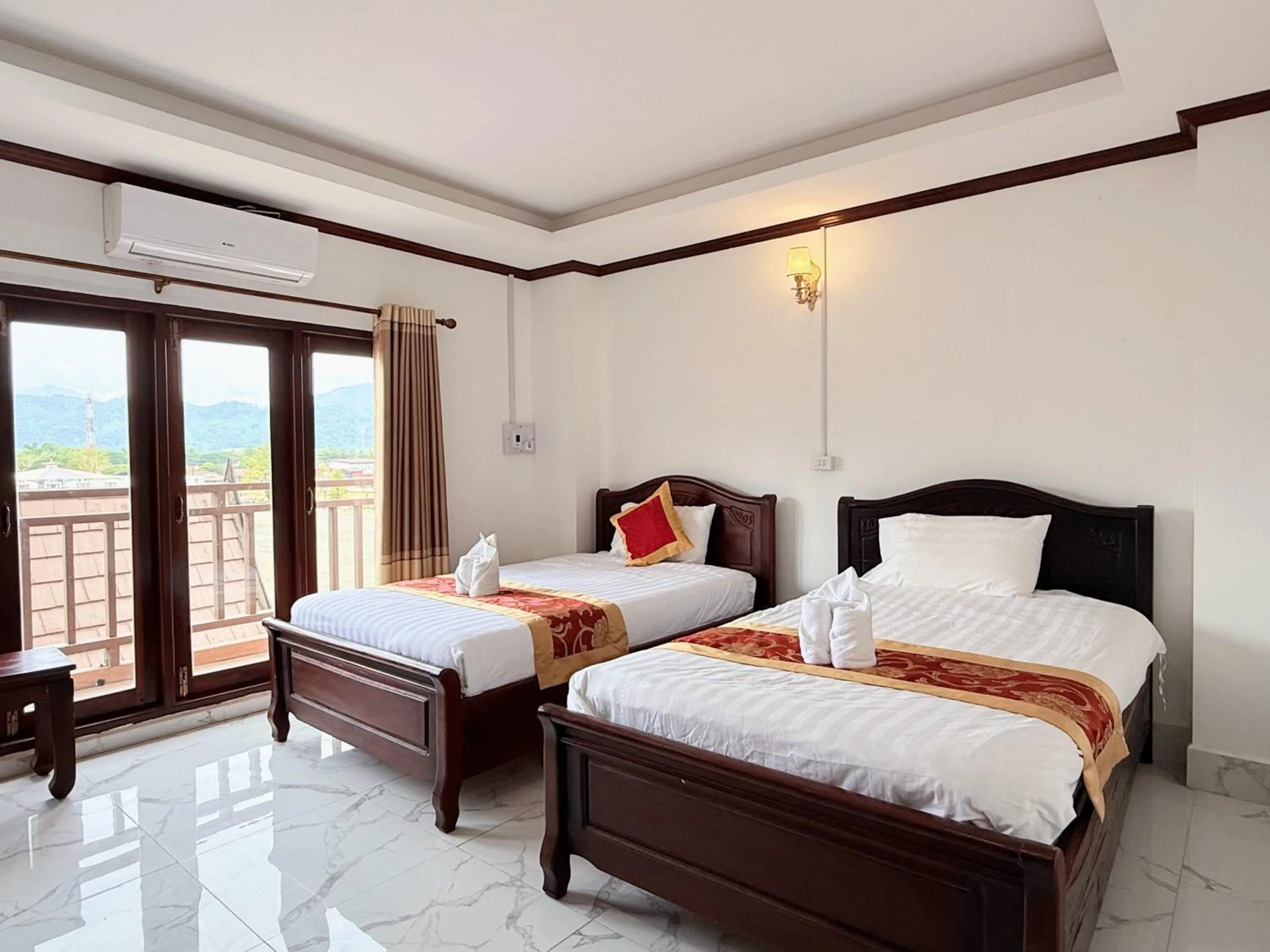 Bed in Vangvieng Sisavang Mountain View Hotel